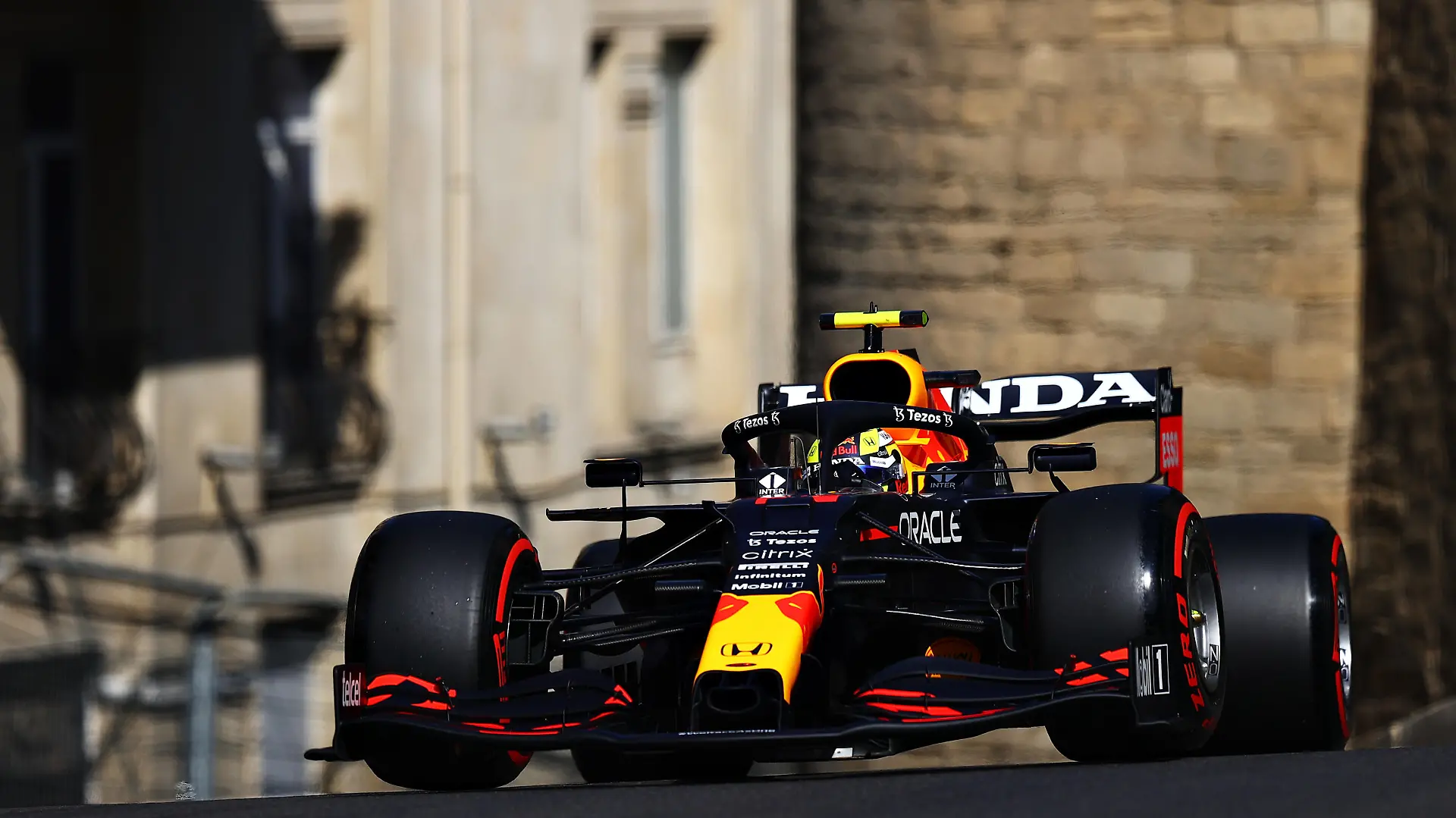 BAKU, AZERBAIJAN - JUNE 04: Sergio Perez of Mexico driving the (11) Red Bull Racing RB16B Honda on track during practice ahead of the F1 Grand Prix of Azerbaijan at Baku City Circuit on June 04, 2021 in Baku, Azerbaijan. (Photo by Francois Nel/Getty Images)