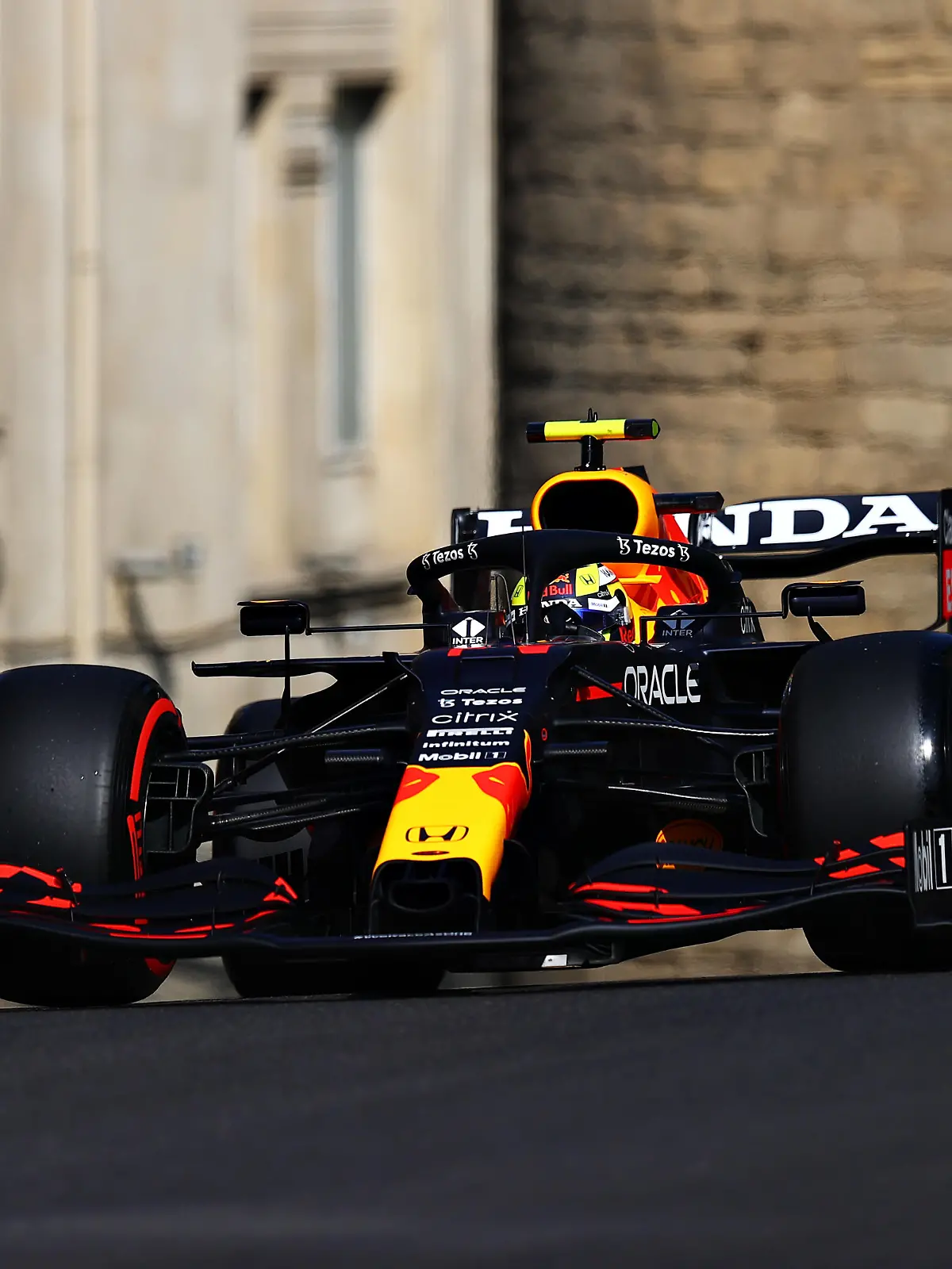 BAKU, AZERBAIJAN - JUNE 04: Sergio Perez of Mexico driving the (11) Red Bull Racing RB16B Honda on track during practice ahead of the F1 Grand Prix of Azerbaijan at Baku City Circuit on June 04, 2021 in Baku, Azerbaijan. (Photo by Francois Nel/Getty Images)
