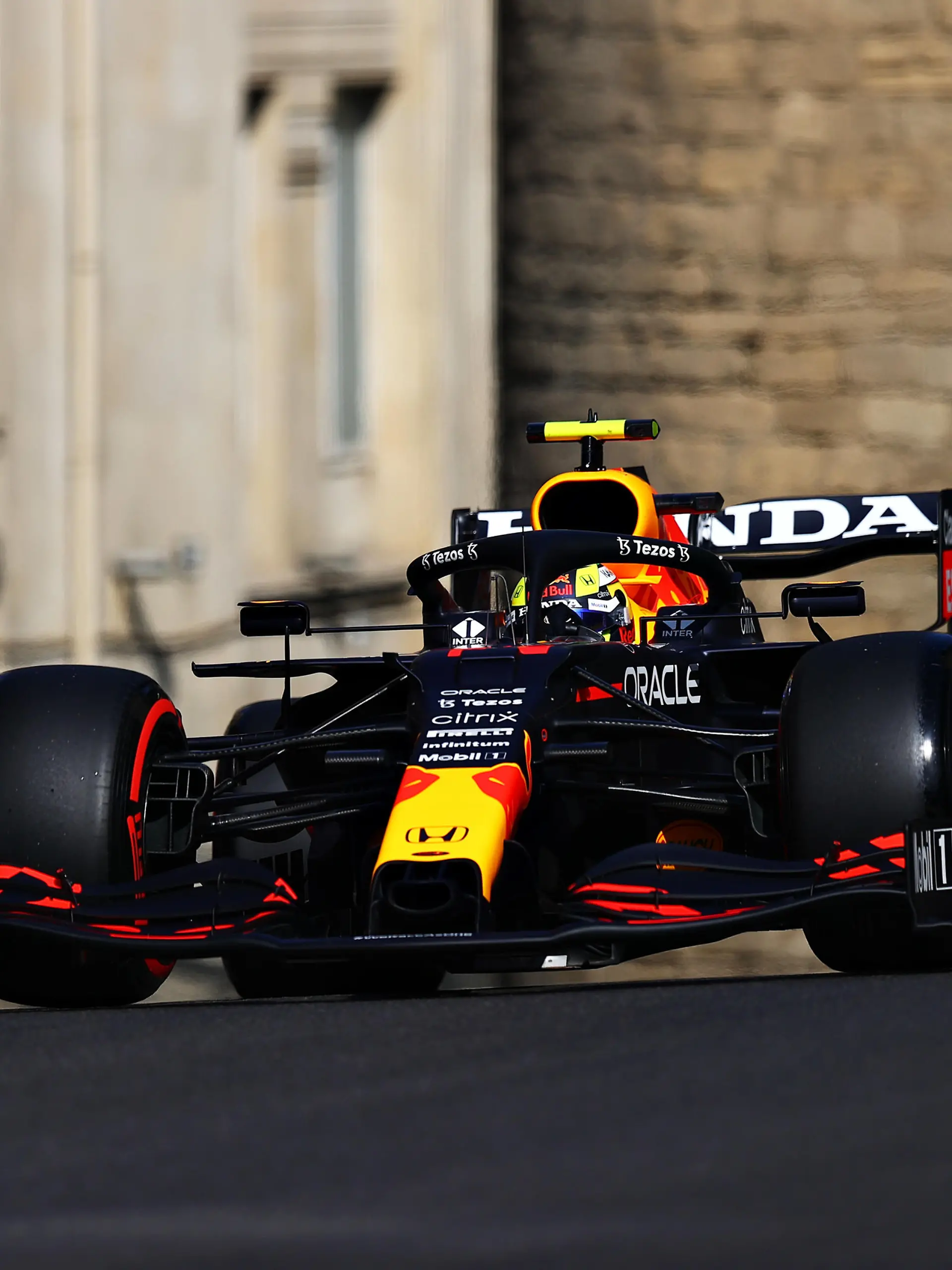 BAKU, AZERBAIJAN - JUNE 04: Sergio Perez of Mexico driving the (11) Red Bull Racing RB16B Honda on track during practice ahead of the F1 Grand Prix of Azerbaijan at Baku City Circuit on June 04, 2021 in Baku, Azerbaijan. (Photo by Francois Nel/Getty Images)