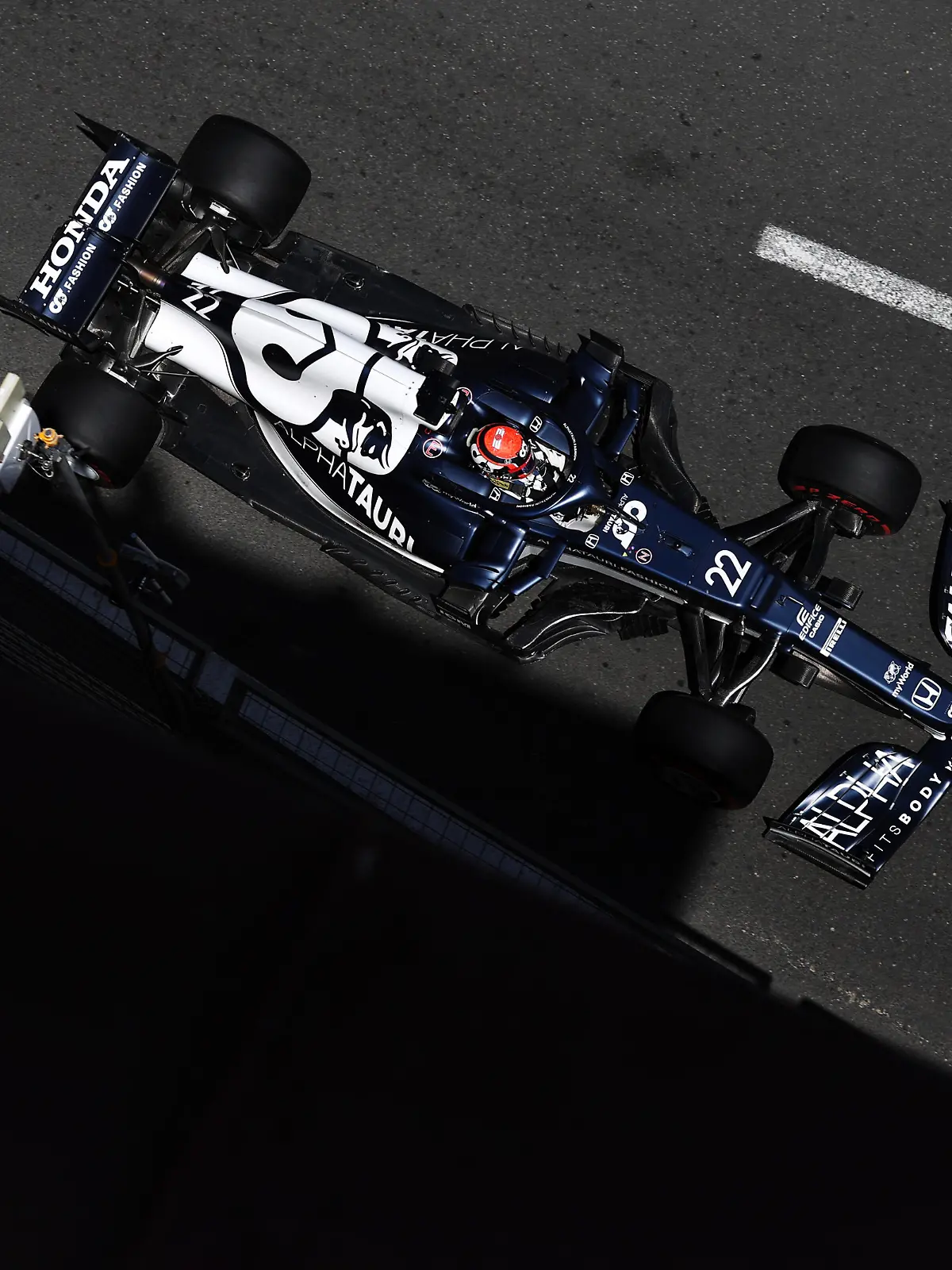 BAKU, AZERBAIJAN - JUNE 04: Yuki Tsunoda of Japan driving the (22) Scuderia AlphaTauri AT02 Honda on track during practice ahead of the F1 Grand Prix of Azerbaijan at Baku City Circuit on June 04, 2021 in Baku, Azerbaijan. (Photo by Clive Rose/Getty Images)