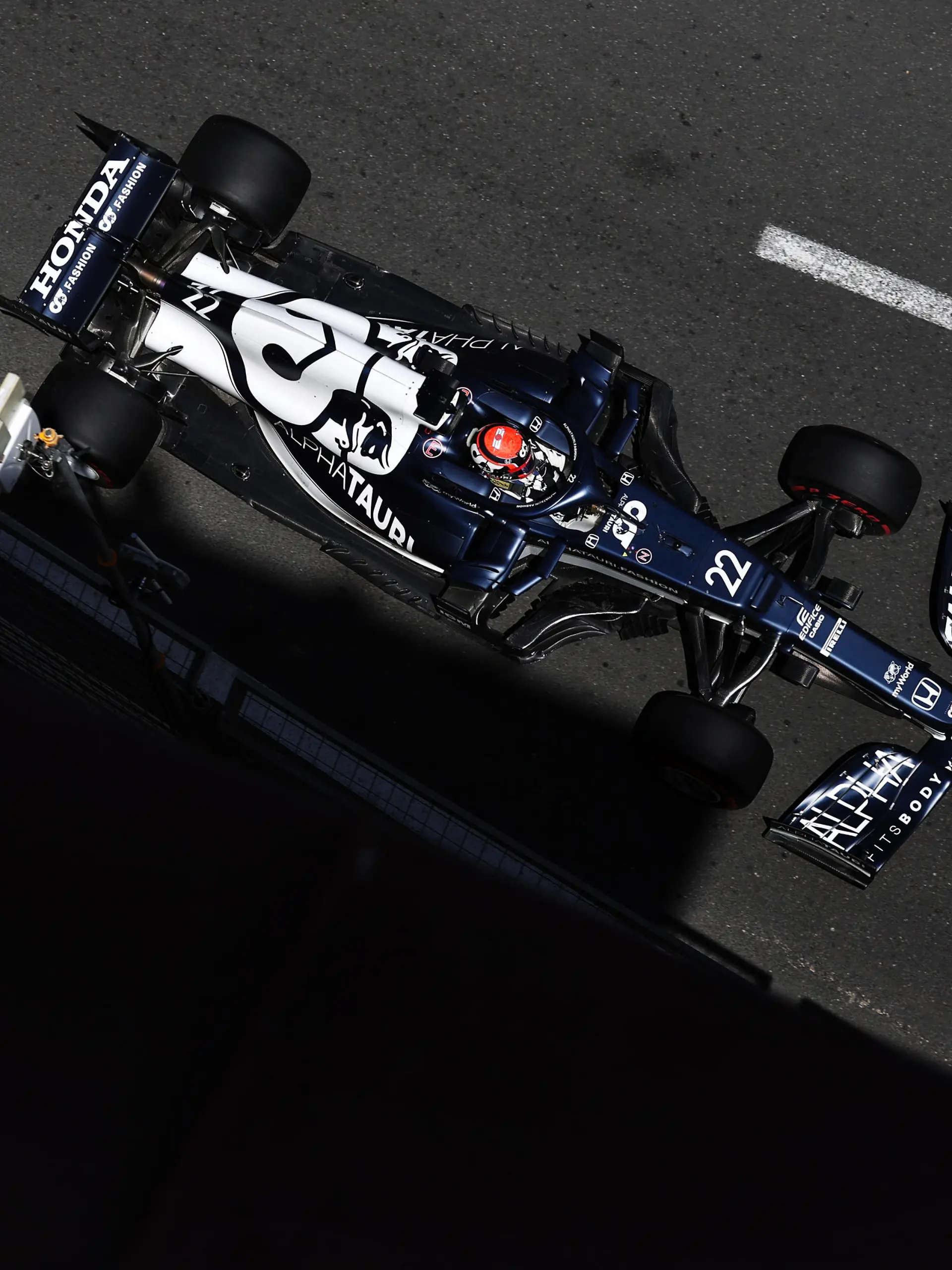 BAKU, AZERBAIJAN - JUNE 04: Yuki Tsunoda of Japan driving the (22) Scuderia AlphaTauri AT02 Honda on track during practice ahead of the F1 Grand Prix of Azerbaijan at Baku City Circuit on June 04, 2021 in Baku, Azerbaijan. (Photo by Clive Rose/Getty Images)