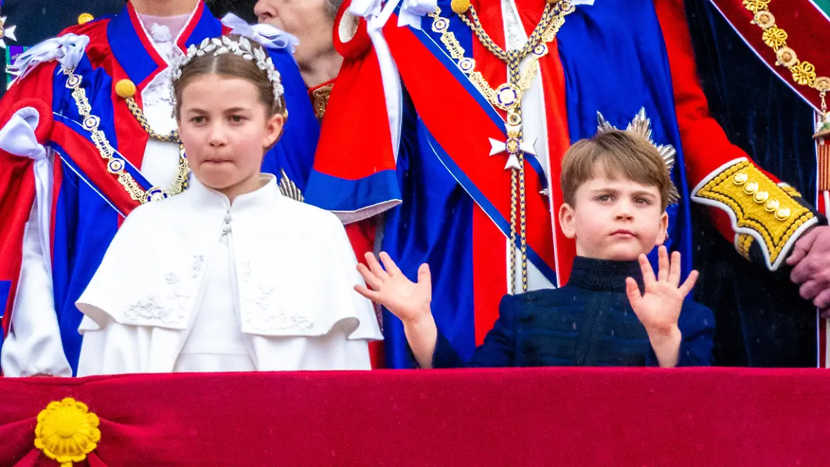 Prince Louis, Princess Charlotte during appearance on the Buckingham Palace balcony to watch the flypast after the procession and the coronation of the new King and Queen at Westminster Abbey in London, UK.