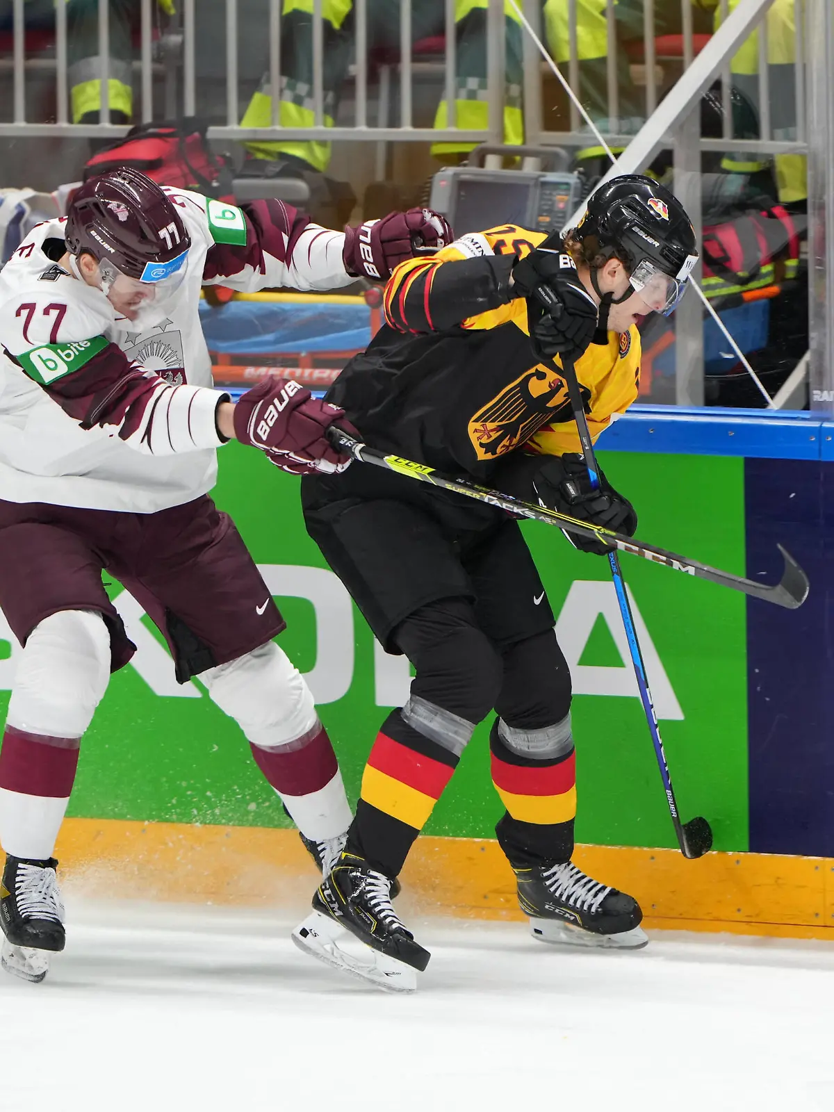 01.06.2021, Riga, Arena Riga, Germany vs Latvia 2021 IIHF Ice hockey, Eishockey World Championship, WM, Weltmeisterschaft , 77 Kristaps Zile Latvia fight for the puck against 15 Stefan Loibl Germany Riga Riga Latvia *** 01 06 2021, Riga, Arena Riga, Germany vs Latvia 2021 IIHF Ice Hockey World Championship , 77 Kristaps Zile Latvia fight for the puck against 15 Stefan Loibl Germany Riga Riga Latvia PUBLICATIONxNOTxINxSUI Copyright: xJustPictures.ch/JarixPestelaccix 