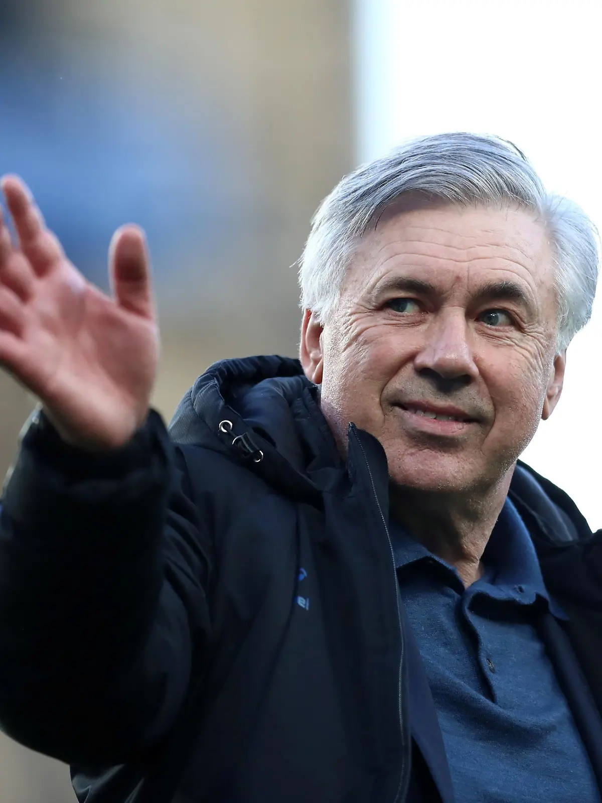 FILE PHOTO: Soccer Football - Premier League - Everton v Wolverhampton Wanderers - Goodison Park, Liverpool, Britain - May 19, 2021 Everton manager Carlo Ancelotti waves to fans during a lap of appreciation after the match, as a limited number of fans are permitted at outdoor sports venues Pool via REUTERS/Jan Kruger EDITORIAL USE ONLY. No use with unauthorized audio, video, data, fixture lists, club/league logos or 'live' services. Online in-match use limited to 75 images, no video emulation. No use in betting, games or single club /league/player publications.  Please contact your account representative for further details./File Photo