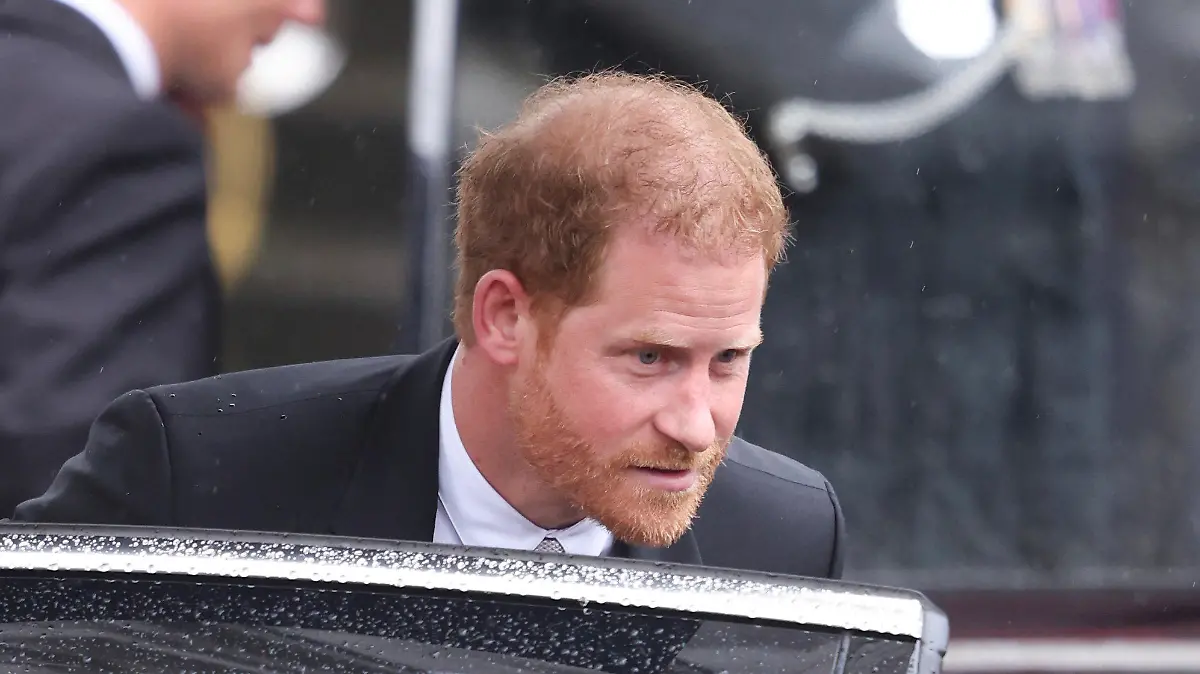 Britain's Prince Harry leaves after the coronation ceremony of King Charles III and Queen Camilla in central London, Saturday, May 6, 2023. (Phil Harris/Pool Photo via AP)