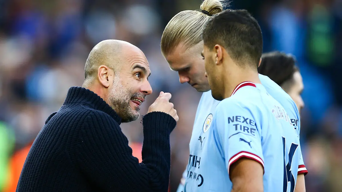 Mandatory Credit: Photo by Matt West/Shutterstock 13895935ez Manager Pep Guardiola of Manchester City with Erling Haland and Rodri Manchester City v West Ham United, Premier League, Football, Etihad Stadium, Manchester, UK - 03 May 2023 EDITORIAL USE ONLY No use with unauthorised audio, video, data, fixture lists, club/league logos or live services. Online in-match use limited to 120 images, no video emulation. No use in betting, games or single club/league/player publications. Manchester City v West Ham United, Premier League, Football, Etihad Stadium, Manchester, UK - 03 May 2023 EDITORIAL USE ONLY No use with unauthorised audio, video, data, fixture lists, club/league logos or live services. Online in-match use limited to 120 images, no video emulation. No use in betting, games or single club/league/player publications. PUBLICATIONxINxGERxSUIxAUTxHUNxGRExMLTxCYPxROUxBULxUAExKSAxONLY Copyright: xMattxWest/Shutterstockx 13895935ez