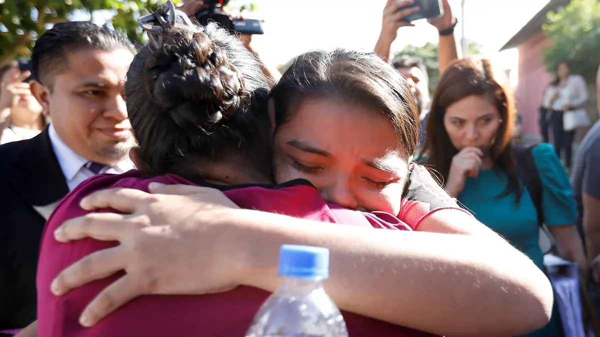 Imelda Cortez is embraced by her as she leaves a court of law after being acquitted of attempted aggravated murder under the country's abortion law, in Usulutan, El Salvador December 17, 2018. REUTERS/Jose Cabezas