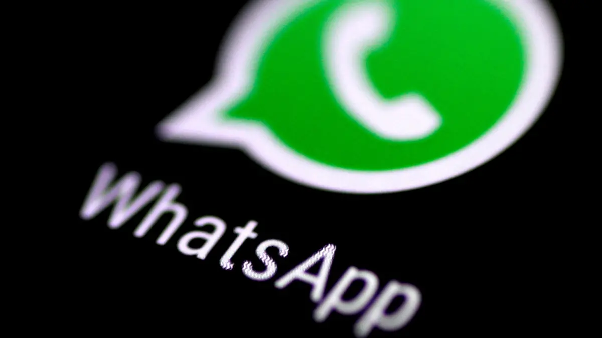 FILE PHOTO: The WhatsApp messaging application is seen on a phone screen August 3, 2017. REUTERS/Thomas White//File Photo