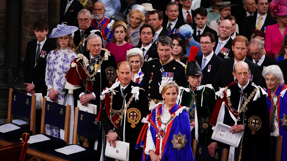 From left, 3rd and 4th row, Prince Andrew, Princess Beatrice, Peter Phillips, Edoardo Mapelli Mozzi, Zara Tindall, Princess Eugenie, Jack Brooksbank, Mike Tindall and Prince Harry, Duke of Sussex, left to right 2nd row, the Earl of Wessex, Lady Louise Windsor, the Duke of Gloucester, the Duchess of Gloucester, the Princess Royal Vice Admiral Sir Tim Laurence, Prince Michael of Kent, Princess Michael of Kent, 1st row, the Duke and Duchess of Edinburgh at the coronation ceremony in Westminster Abbey, London, Saturday May 6, 2023. (Yui Mok, Pool via AP)