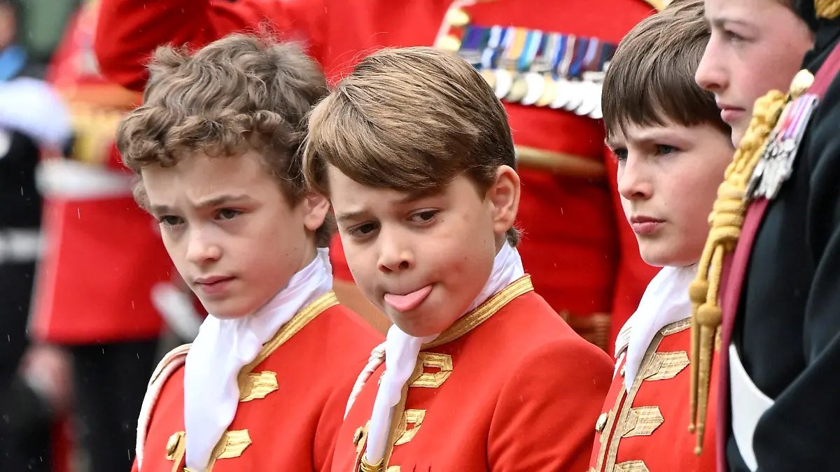Prince George reacts on the day of coronation of Britain's King Charles and Queen Camilla's coronation ceremony at Westminster Abbey in London, Britain May 6, 2023.     Andy Stenning/Pool via REUTERS