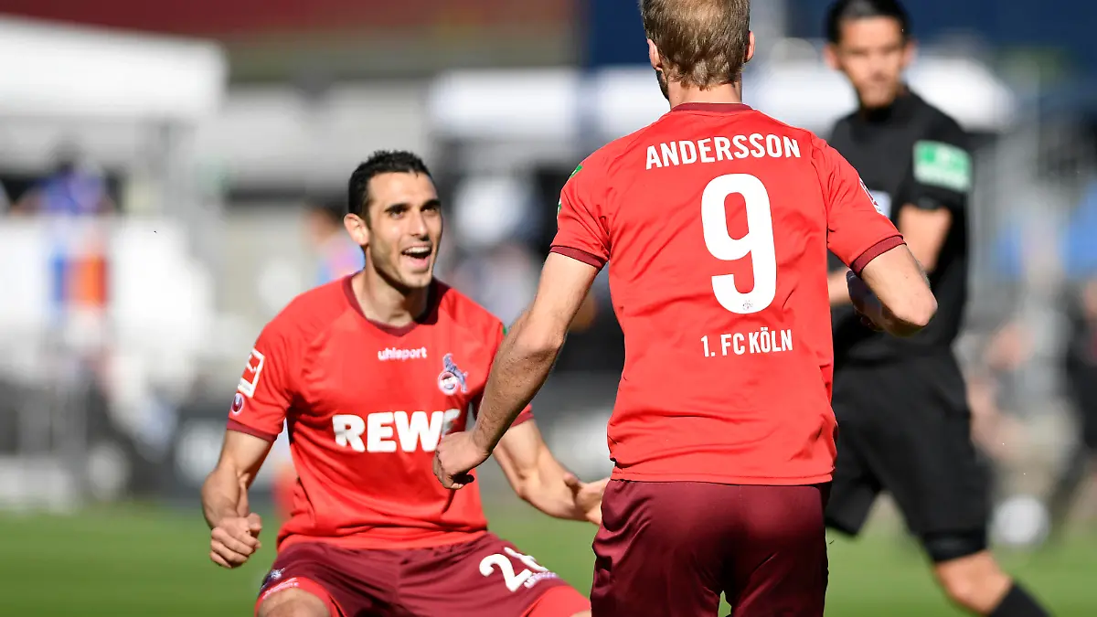 GER, 1.FBL, Relegation, Holstein Kiel vs 1. FC Koeln / 29.05.2021, Holstein-Stadion, Kiel, GER, 1.FBL, Relegation, Holstein Kiel vs 1. FC Koeln, im Bild Sebastian Andersson 1. FC Koeln 9 Torjubel, jubelt mit Ellyes Skhiri 1. FC Koeln 28 nach dem Treffer zum 1:2 *** GER, 1 FBL, Relegation, Holstein Kiel vs 1 FC Koeln 29 05 2021, Holstein Stadion, Kiel, GER, 1 FBL, Relegation, Holstein Kiel vs 1 FC Koeln, in picture Sebastian Andersson 1 FC Koeln 9 goal celebration, cheers with Ellyes Skhiri 1 FC Koeln 28 after the goal to 1 2 nordphotoxGmbHx/xTreese nph00275