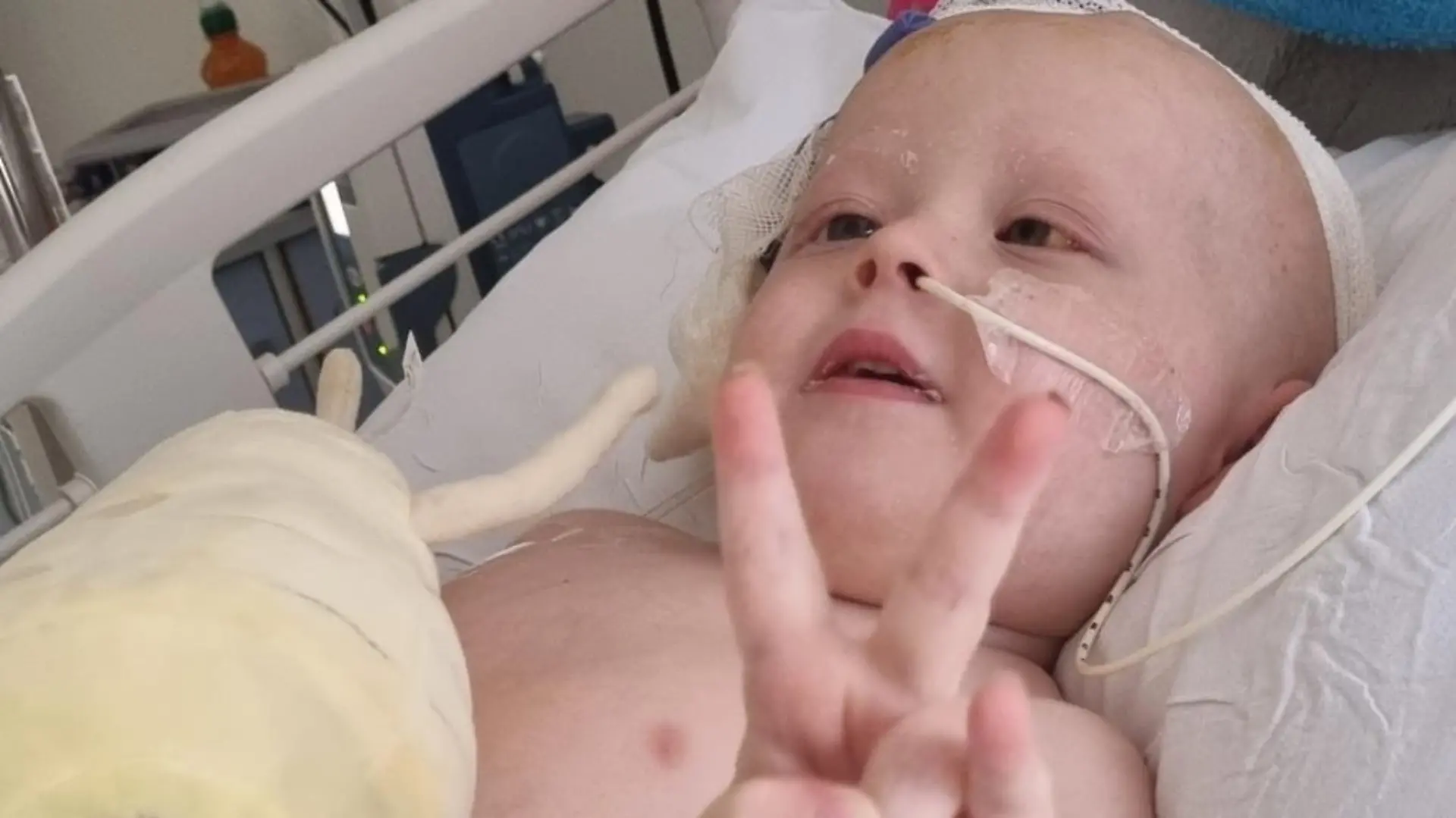 Story from Jam Press (Clumsy Cancer)
Pictured: Jett in hospital.
Mum told son had viral infection by doctors devastated after symptoms turn out to be brain tumour – after SEVEN visits to A&E
A mother is warning fellow parents to watch out for unusual health symptoms after claiming doctors said her six-year-old son’s cancer was “viral infection”.
Keiley Ebbs first noticed something was wrong with her little boy, Jett, when he began complaining of pain in his arms and legs, experienced morning sickness and became clumsy, randomly walking into things.
She was allegedly told by medical professionals that the symptoms were a sign of a viral infection.
Sensing in her gut that there was more to her son’s behaviour and after seven visits to A&E, the mum pushed for further investigation.
A devastating scan revealed a brain tumour travelling down his spine.
“They kept saying it was a viral infection, and to take him home and give him over-the-counter medication,” The 38-year-old from Lincolnshire told http://NeedToKnow.co.uk.
“I had it in my head that he had a brain tumour, I’d seen the symptoms before in my job as a carer.
“I was frustrated that the doctors kept saying the same thing and didn’t seem to listen to me.
“I feel like they thought I was exaggerating but I knew there was something seriously wrong with him.”
Returning to A&E for the seventh time on 13 December, doctors agreed to give Jett a CT scan and the results were horrifying.
He was diagnosed with a brain tumour and was immediately rushed to Sheffield hospital where he underwent a 10-hour surgery to remove the mass.
She said: “It’s so hard to even explain, it was so quick.
“They said ‘Jett has a brain tumour, we are blue-lighting you to Sheffield’.
“I can remember sitting in the ambulance ride.
“Not knowing what was going on, he was so excited to be in an ambulance and my journey was a complete blur, it was so bizarre.
“The nurse kept checking on me b