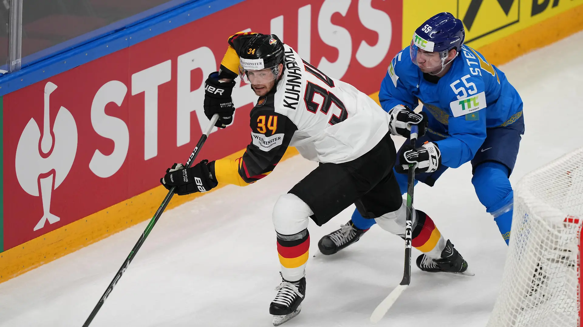 26.05.2021, Riga, Arena Riga, Kazakhstan vs Germany 2021 IIHF Ice hockey, Eishockey World Championship, WM, Weltmeisterschaft , 34 Tom Kuhnhackl Germany protect the puck from 55 Ivan Stepanenko Kazakhstan Riga Riga Latvia *** 26 05 2021, Riga, Arena Riga, Kazakhstan vs Germany 2021 IIHF Ice Hockey World Championship , 34 Tom Kuhnhackl Germany protect the puck from 55 Ivan Stepanenko Kazakhstan Riga Latvia PUBLICATIONxNOTxINxSUI Copyright: xJustPictures.ch/JarixPestelaccix 