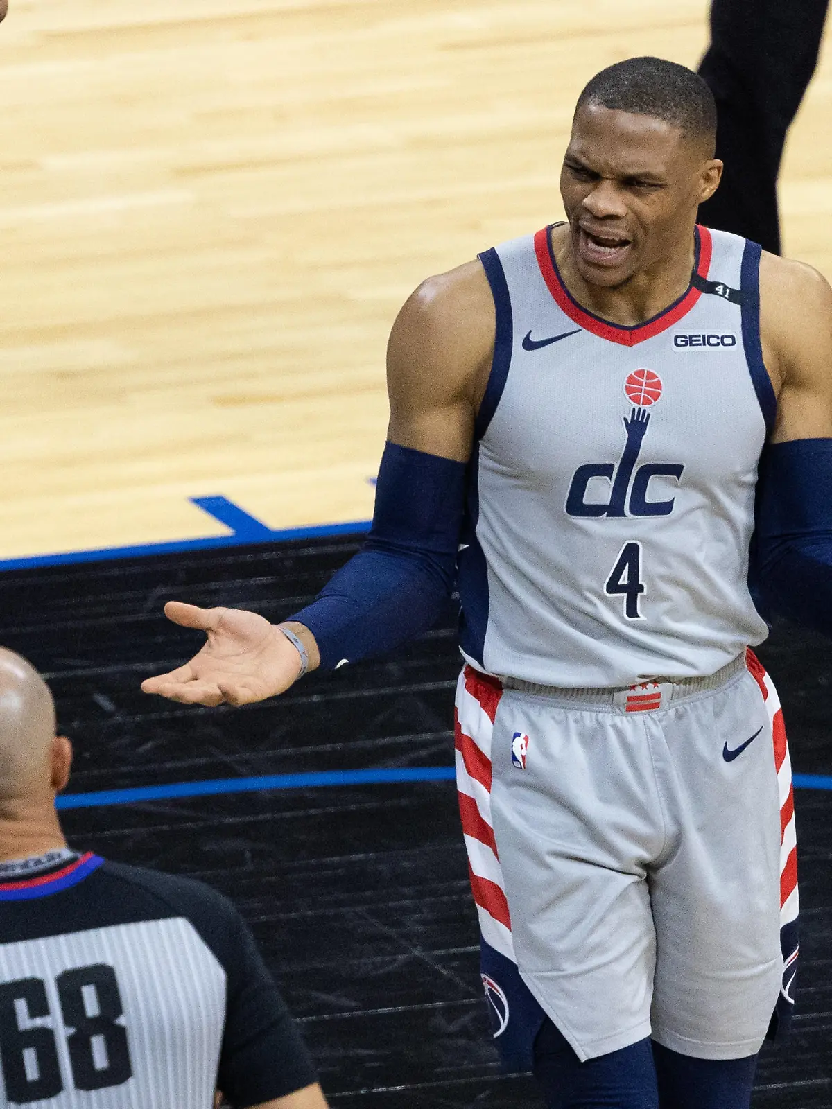 May 26, 2021; Philadelphia, Pennsylvania, USA; Washington Wizards guard Russell Westbrook (4) argues a call with referee Jacyn Goble (68) during the fourth quarter of game two against the Philadelphia 76ers in the first round of the 2021 NBA Playoffs at Wells Fargo Center. Mandatory Credit: Bill Streicher-USA TODAY Sports