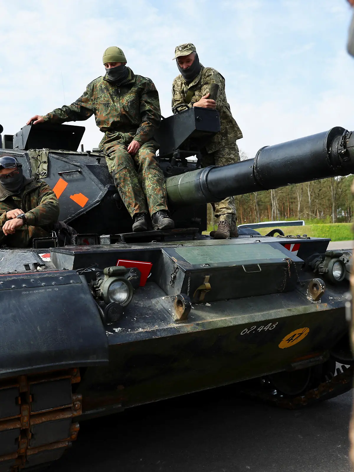 Ukrainian soldiers are pictured on a Leopard 1A5 tank, at the German army Bundeswehr base, part of the EU Military Assistance Mission in support of Ukraine (EUMAM Ukraine) in Klietz, Germany, May 5, 2023. REUTERS/Fabrizio Bensch