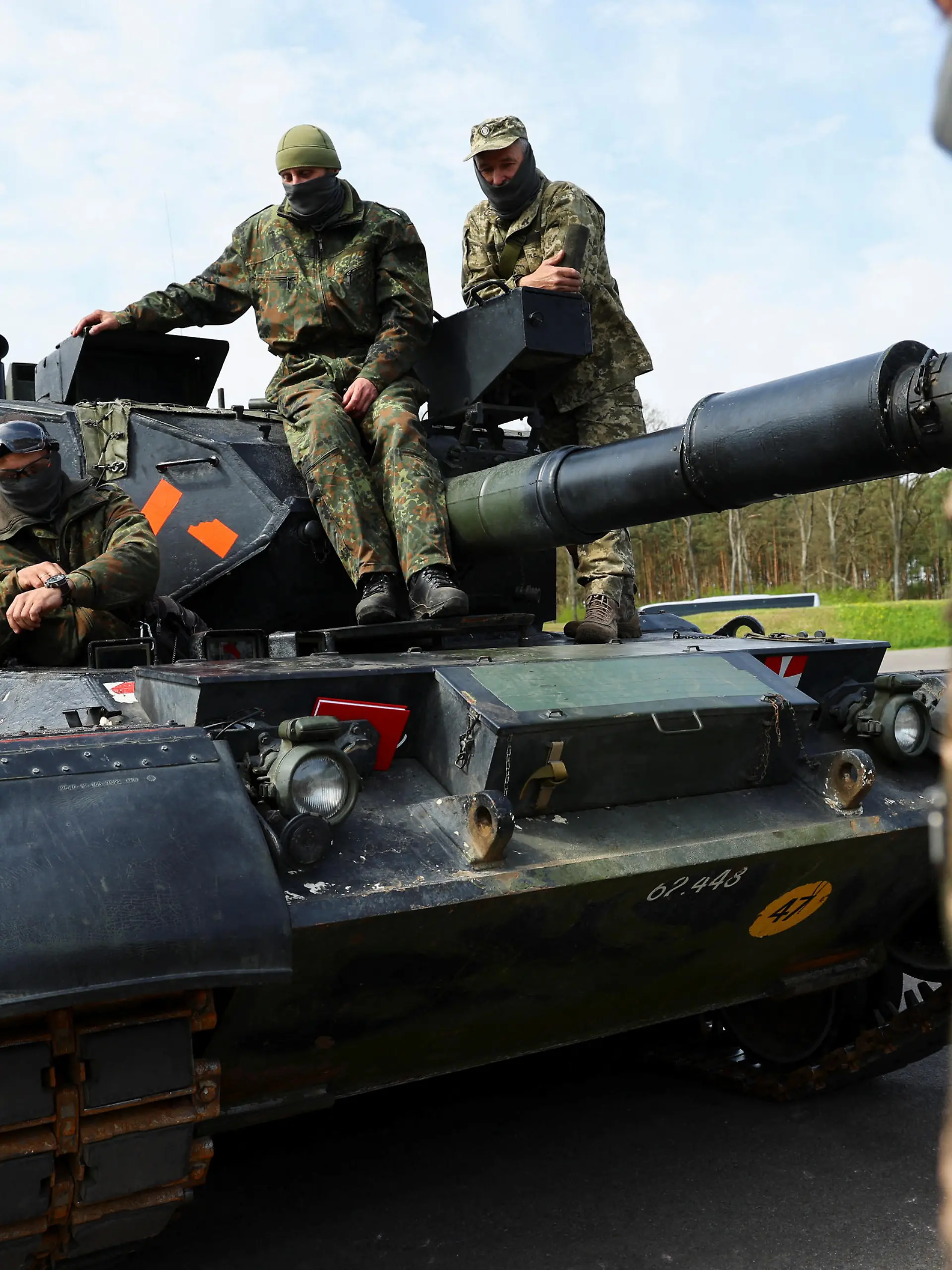 Ukrainian soldiers are pictured on a Leopard 1A5 tank, at the German army Bundeswehr base, part of the EU Military Assistance Mission in support of Ukraine (EUMAM Ukraine) in Klietz, Germany, May 5, 2023. REUTERS/Fabrizio Bensch
