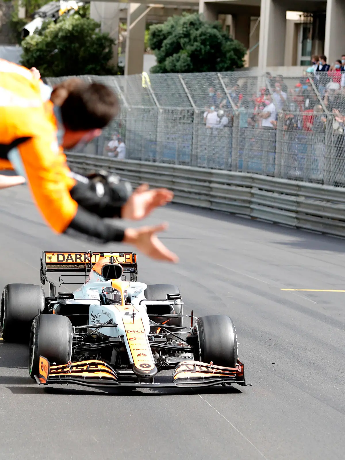 Formula 1 2021: Monaco GP CIRCUIT DE MONACO, MONACO - MAY 23: Lando Norris, McLaren MCL35M, 3rd position, crosses the line to the cheers of his team on the pit wall during the Monaco GP at Circuit de Monaco on Sunday May 23, 2021 in Monte Carlo, Monaco. Photo by Glenn Dunbar / LAT Images Images PUBLICATIONxINxGERxSUIxAUTxHUNxONLY GP2105_134139_69I5197 