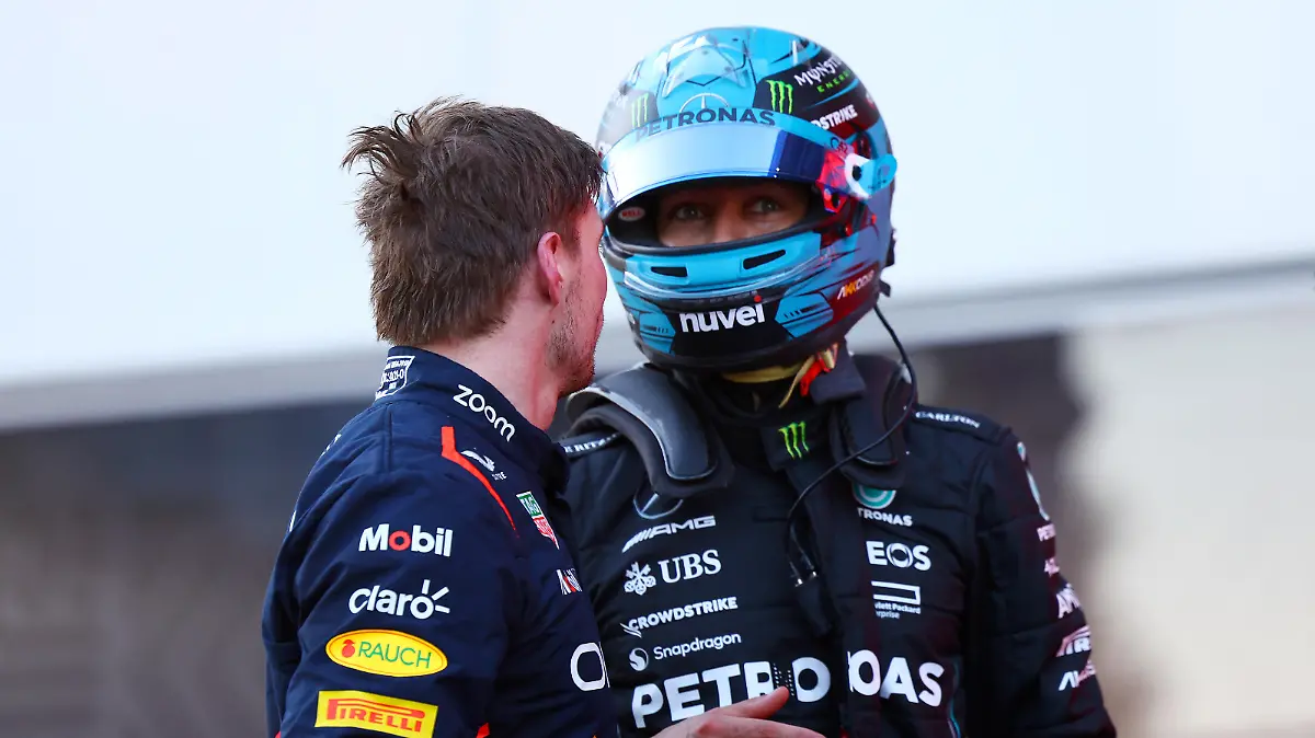 BAKU, AZERBAIJAN - APRIL 29: Third placed Max Verstappen of the Netherlands and Oracle Red Bull Racing and 4th placed George Russell of Great Britain and Mercedes talk in parc ferme during the Sprint ahead of the F1 Grand Prix of Azerbaijan at Baku City Circuit on April 29, 2023 in Baku, Azerbaijan. (Photo by Mark Thompson/Getty Images)