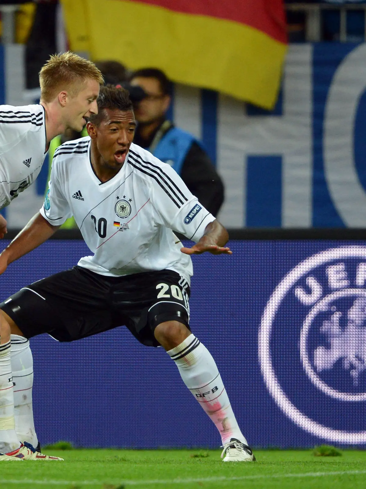 Germany's Marco Reus (L) celebrates with teammate Jerome Boateng after scoring the 4-1 during UEFA EURO 2012 quarter- final soccer match Germany vs Greece at Arena Gdansk in Gdansk, Poland, 22 June 2012. Photo: Marcus Brandt dpa (Please refer to chapters 7 and 8 of http://dpaq.de/Ziovh for UEFA Euro 2012 Terms & Conditions)  +++(c) dpa - Bildfunk+++