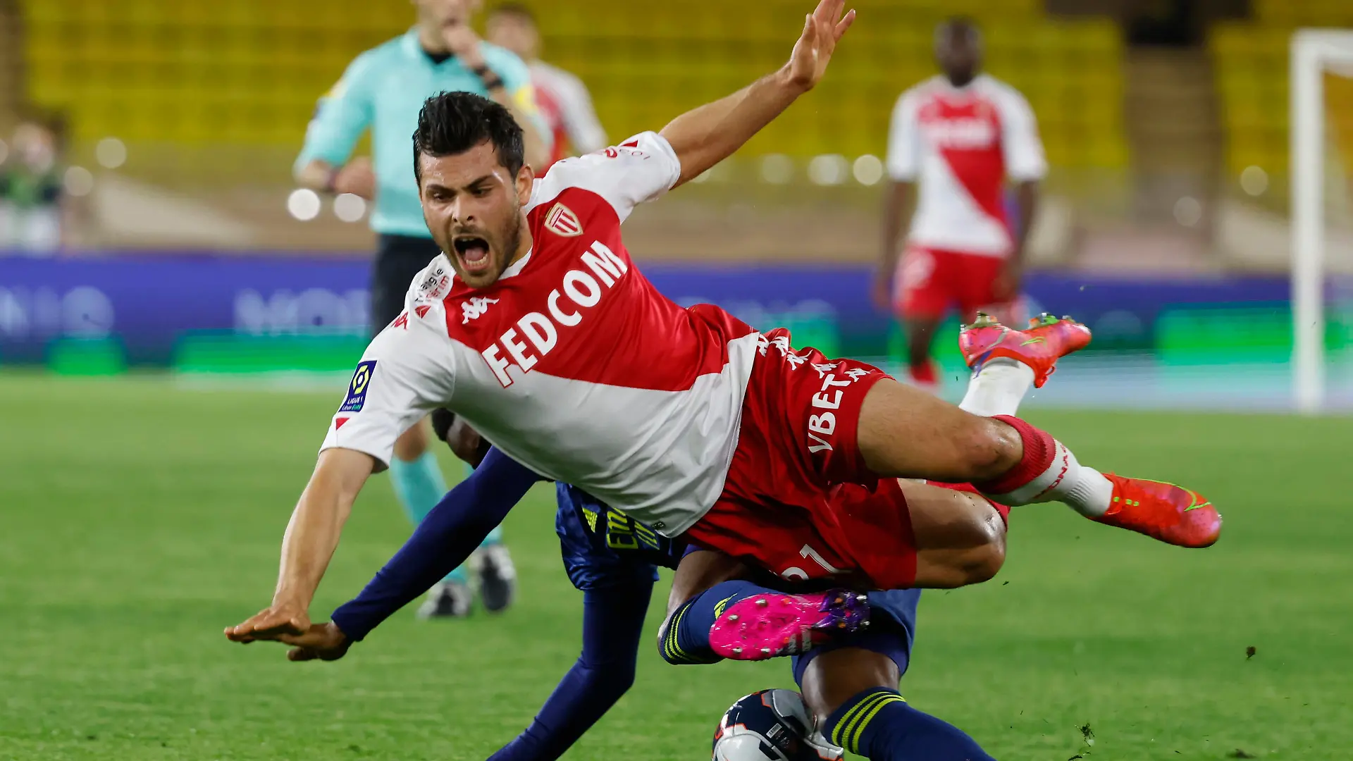 Soccer Football - Ligue 1 - AS Monaco v Olympique Lyonnais - Stade Louis II, Monaco - May 2, 2021 AS Monaco's Kevin Volland in action with Olympique Lyonnais' Sinaly Diomande REUTERS/Eric Gaillard
