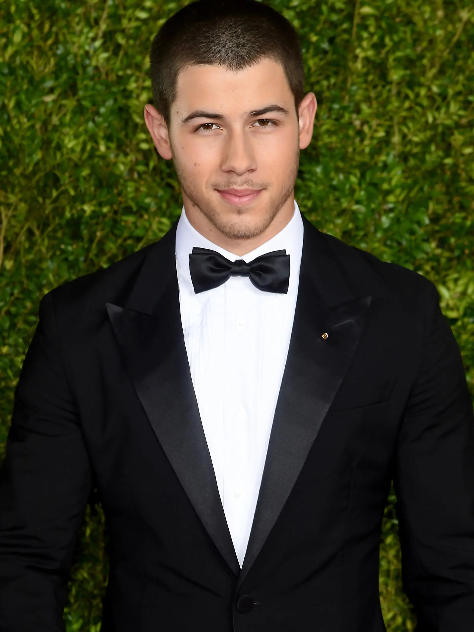 NEW YORK, NY - JUNE 07: Nick Jonas attends the 2015 Tony Awards  at Radio City Music Hall on June 7, 2015 in New York City.  (Photo by Dimitrios Kambouris/Getty Images for Tony Awards Productions)