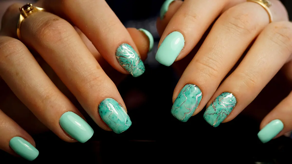 Awesome nails and beautiful clean manicure. Nails are natural. Manicure is made using nails drill machine.