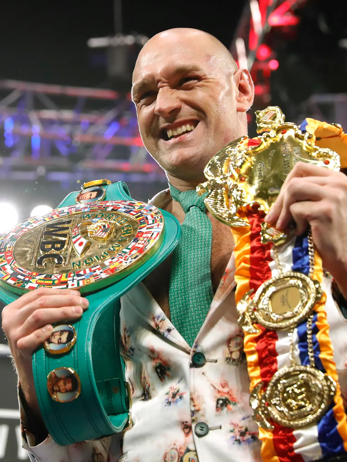 Boxing - Deontay Wilder v Tyson Fury - WBC Heavyweight Title - The Grand Garden Arena at MGM Grand, Las Vegas, United States - February 22, 2020 Tyson Fury poses with his belts during a press conference after the fight REUTERS/Steve Marcus