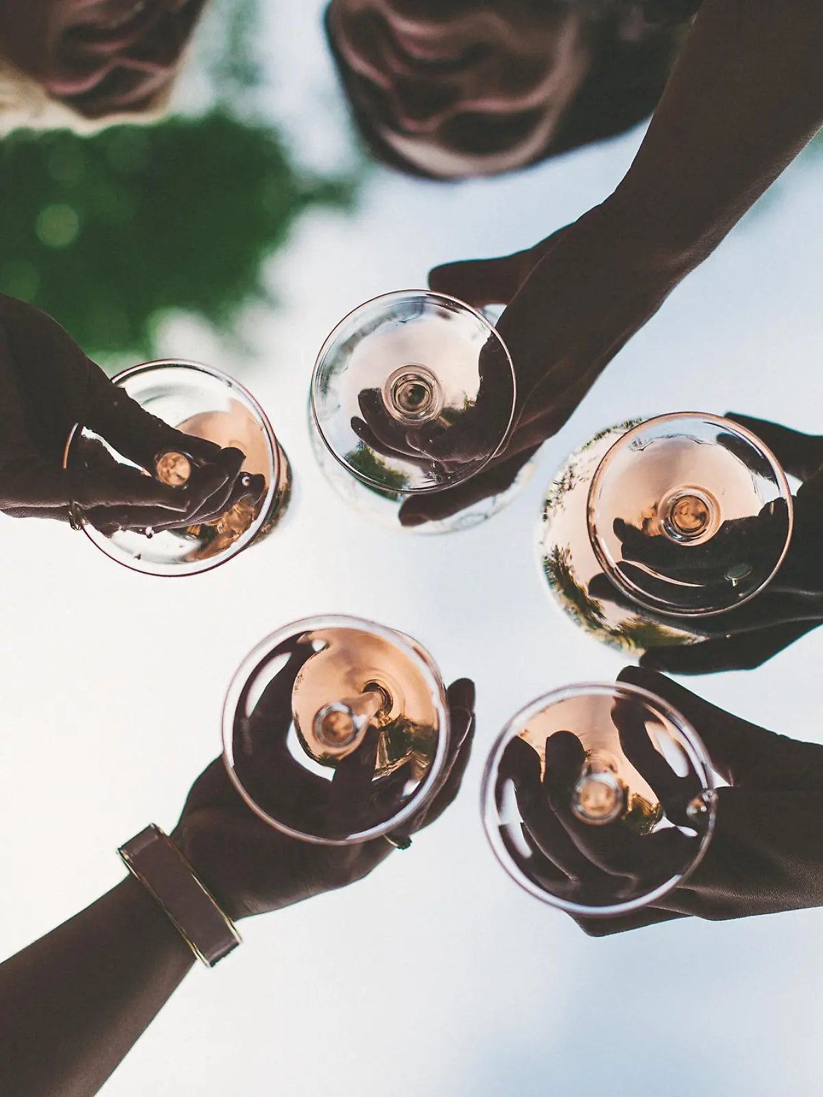 Woman toasting with sparkling wine and champagne