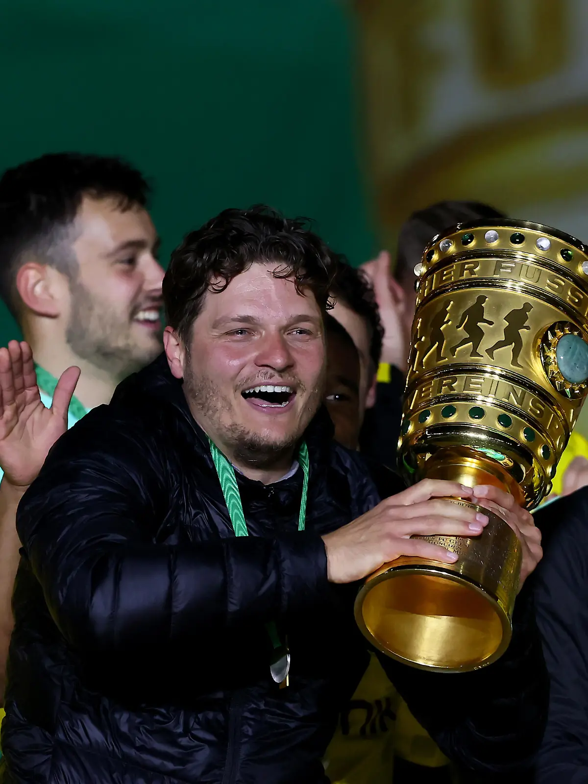BERLIN, GERMANY - MAY 13: Head coach Edin Terzic (C) of Borussia Dortmund celebrates with the trophy after winning the DFB Cup final match between RB Leipzig and Borussia Dortmund at Olympic Stadium on May 13, 2021 in Berlin, Germany. Sporting stadiums around Germany remain under strict restrictions due to the Coronavirus Pandemic as Government social distancing laws prohibit fans inside venues resulting in games being played behind closed doors. (Photo by Martin Rose/Getty Images)