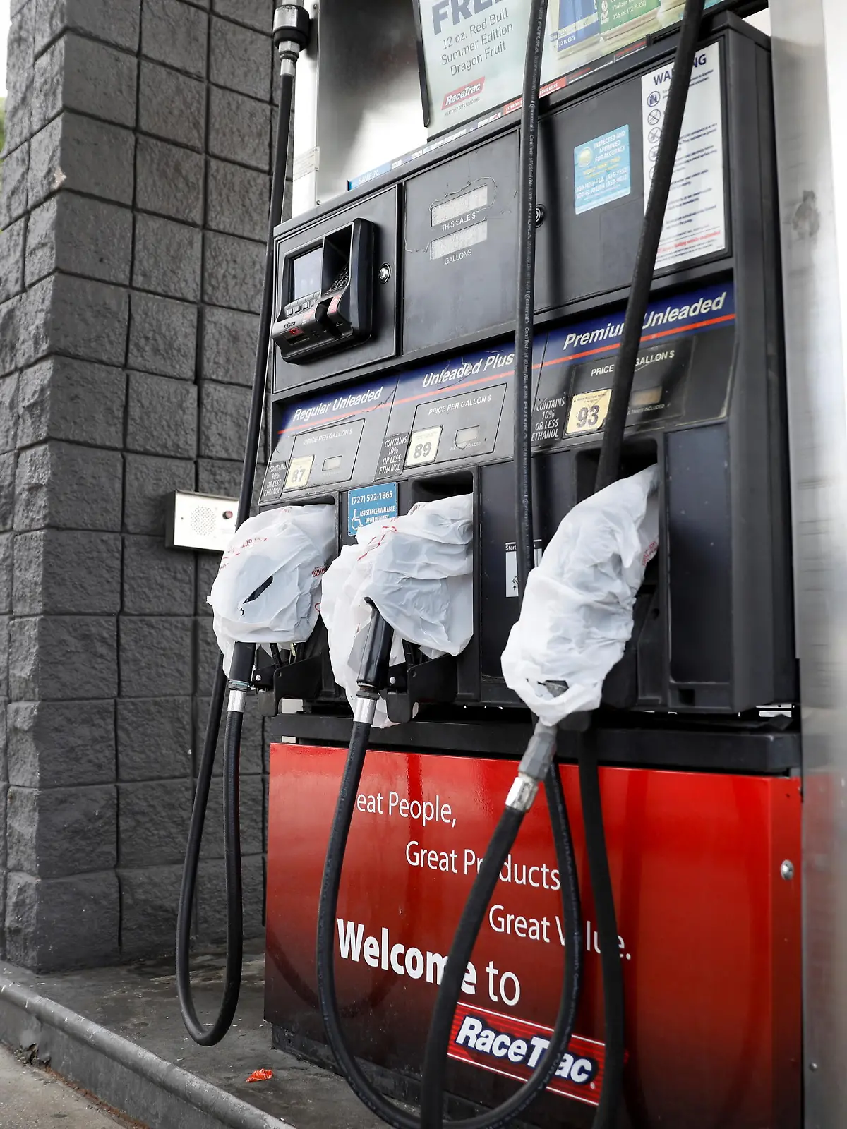 Gas pumps are covered with plastic bags at the Race Trac gas station, after a cyberattack crippled the biggest fuel pipeline in the country, run by Colonial Pipeline, in St. Petersburg, Florida, U.S., May 12, 2021. REUTERS/Octavio Jones