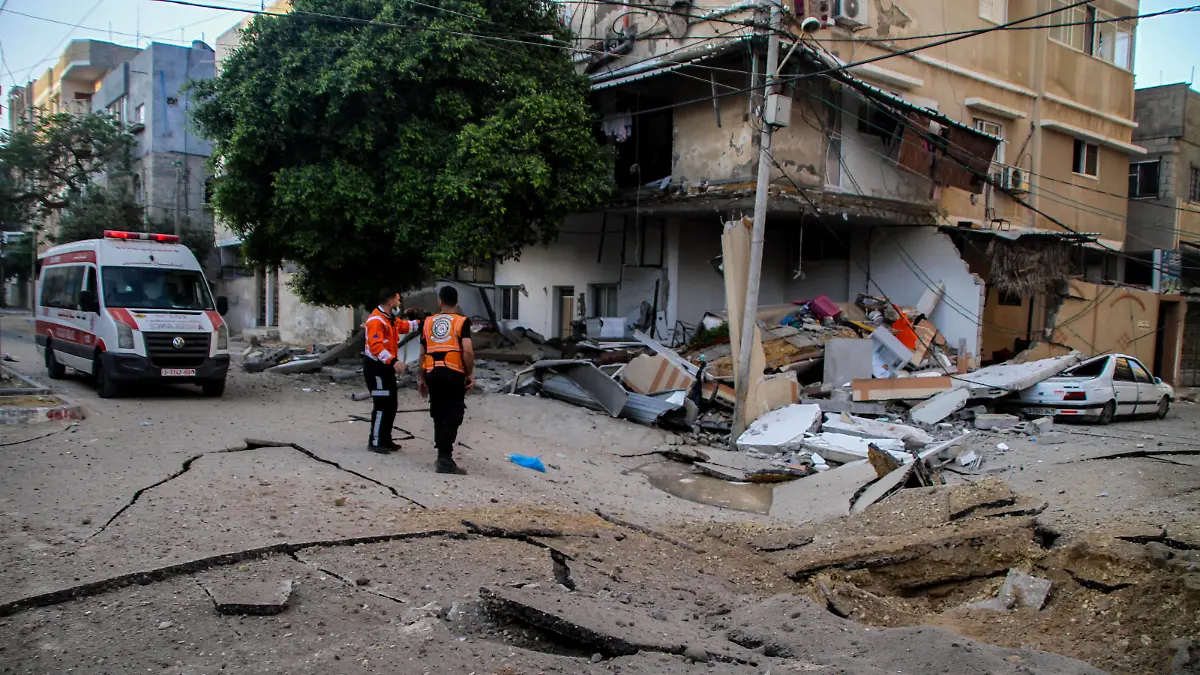 May 11, 2021: Gaza, Palestine. 12 May 2021. Roads and houses on the west of Gaza City have been hit by Israeli jets on Wednesday morning as airstrikes intensify in the entire Gaza Strip. The escalation of violence between the Gaza Strip and Israel continues on Wednesday for a third day with 53 Palestinians killed in Gaza by the Israeli air raids and 6 Israelis killed by the rockets fired from Gaza. Tensions have been running high in the region since last week protests and clashes in Jerusalem over Israeli raids on Al-Aqsa Mosque compound and the threat of expulsion of Palestinian families from East Jerusalem - ZUMAd99_ 20210511_zap_d99_044 Copyright: xAhmadxHasaballahx