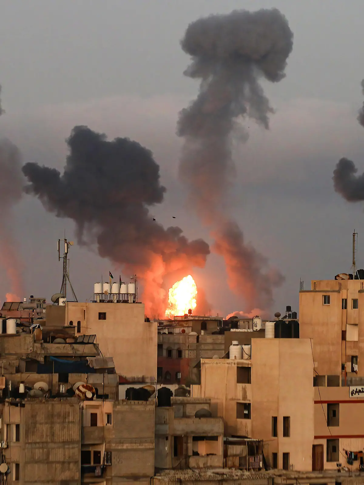 May 11, 2021, Gaza, Palestine: Clouds of dark smoke seen over Gaza City after an Israeli air strike. .Explosions and fire caused by Israeli air strikes in the southern Gaza Strip, and Israel launched air strikes on the coastal strip in response to a barrage of rockets fired by Palestinians into Israel. Gaza Palestine - ZUMAs197 20210511_zaa_s197_252 Copyright: xYousefxMasoudx 