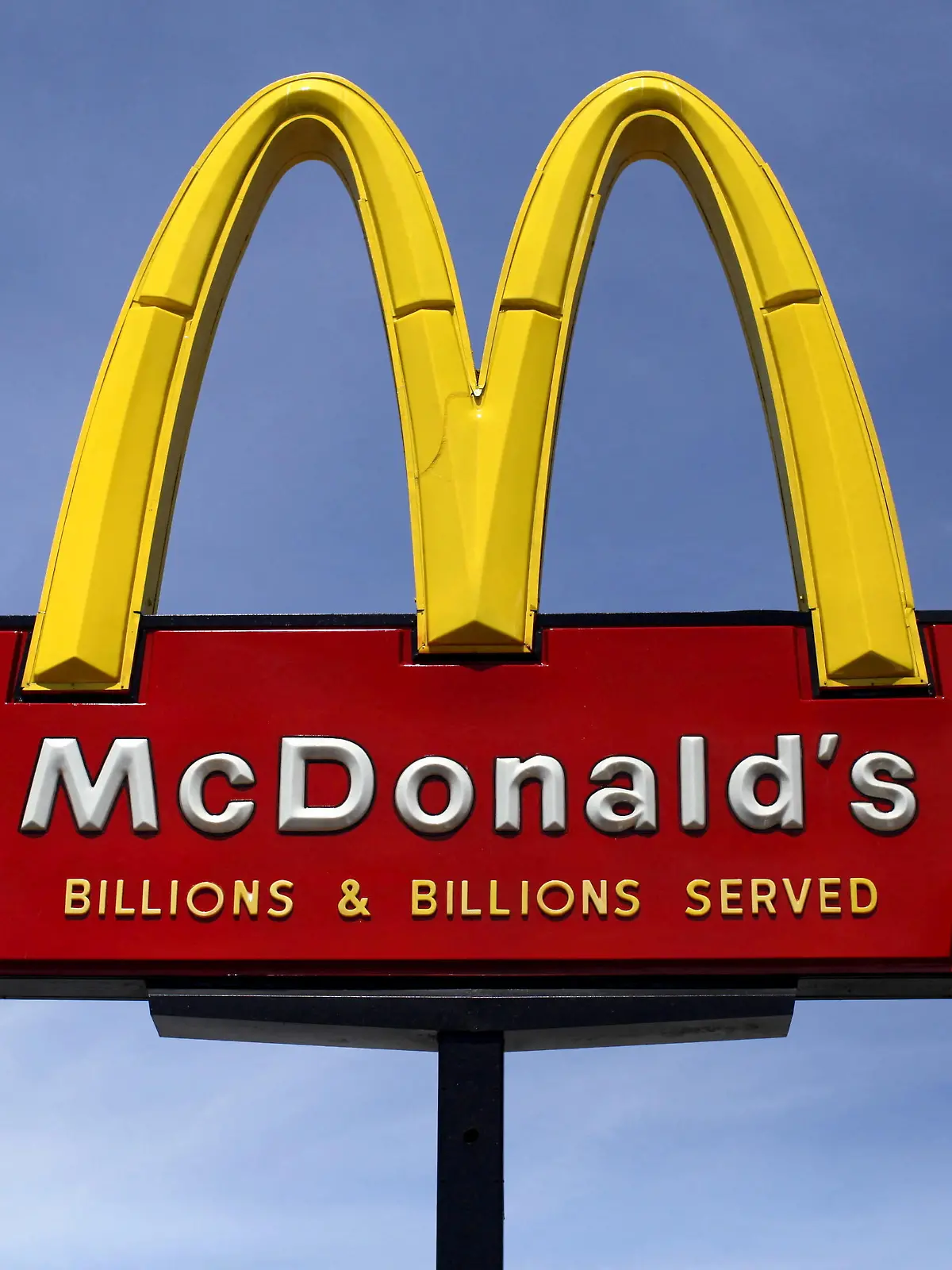 FILE PHOTO: A McDonald's restaurant sign is seen in San Diego, California March 31, 2015. REUTERS/Mike Blake/File Photo