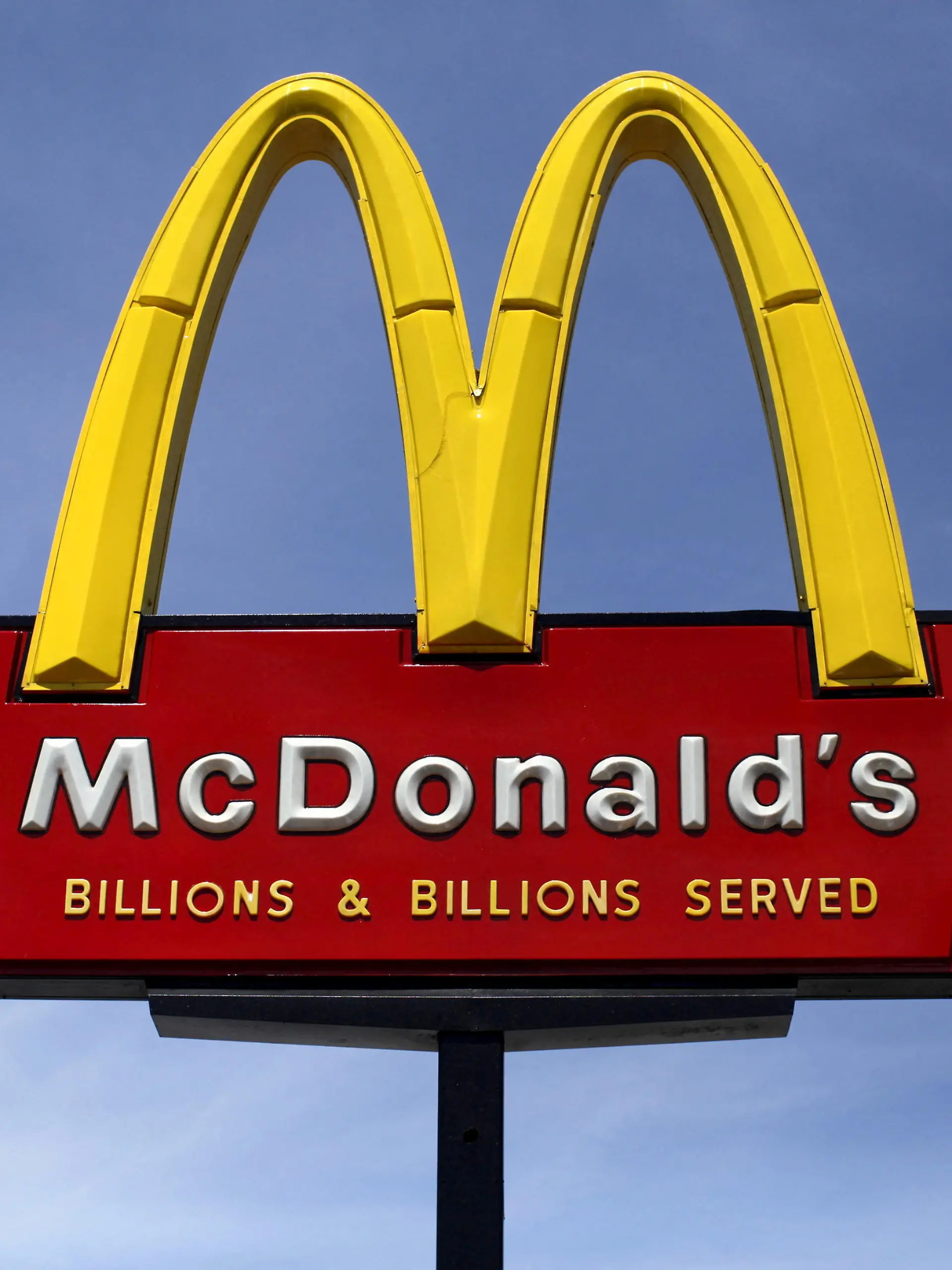FILE PHOTO: A McDonald's restaurant sign is seen in San Diego, California March 31, 2015. REUTERS/Mike Blake/File Photo