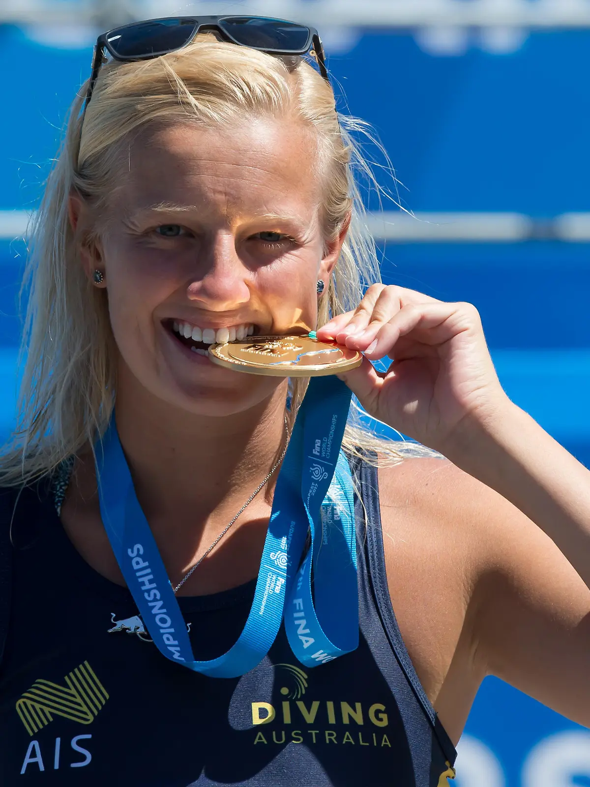 Rhiannan Iffland of Australia celebrates her victory during the awarding ceremony for the Women's 20m High Dive final at the 17th FINA Aquatics World Championships held in Budapest, Hungary on July 29, 2017.
