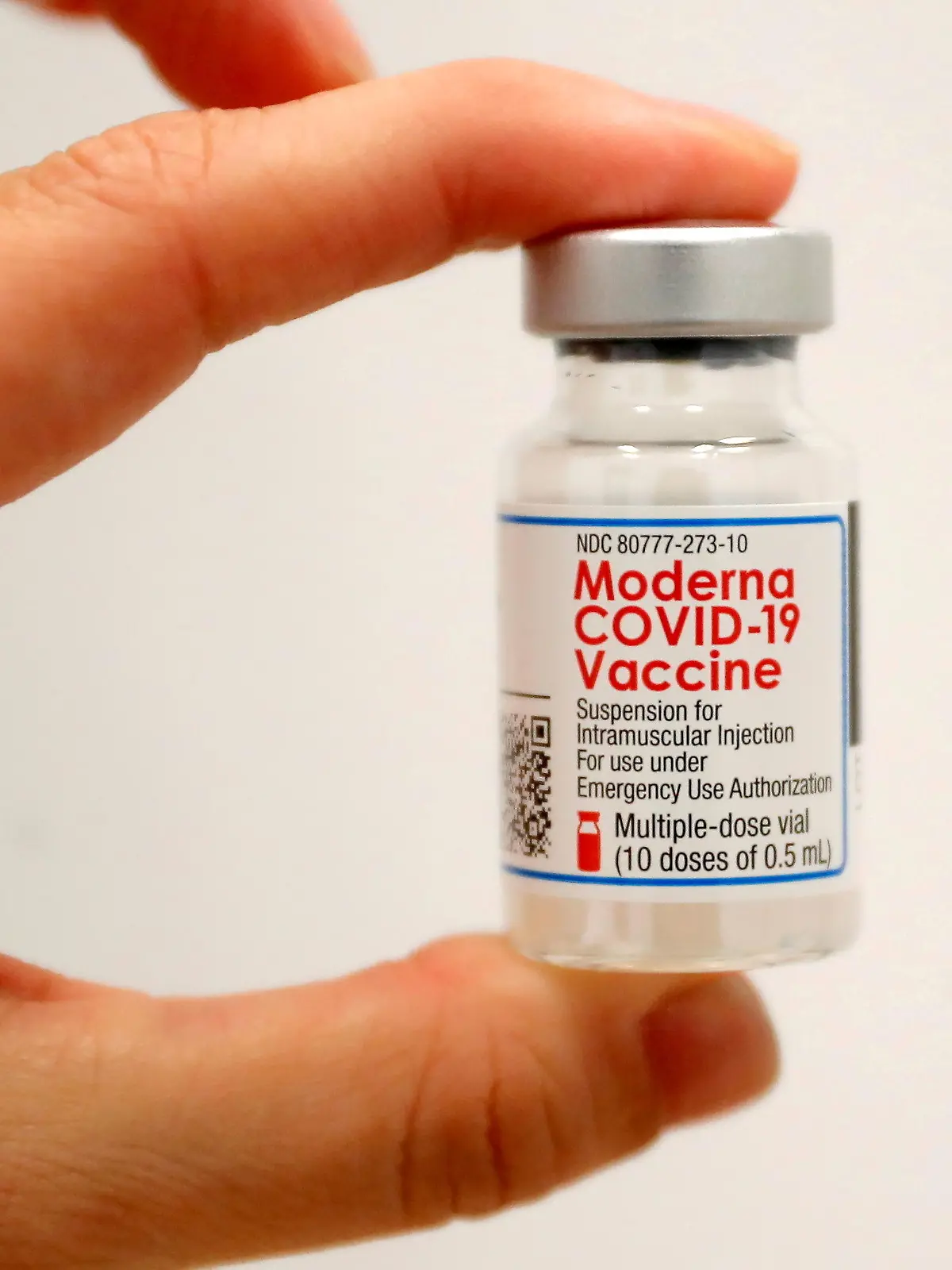 FILE PHOTO: A healthcare worker holds a vial of the Moderna COVID-19 Vaccine at a pop-up vaccination site operated by SOMOS Community Care during the coronavirus disease (COVID-19) pandemic in Manhattan in New York City, New York, U.S., January 29, 2021. REUTERS/Mike Segar/File Photo/File Photo
