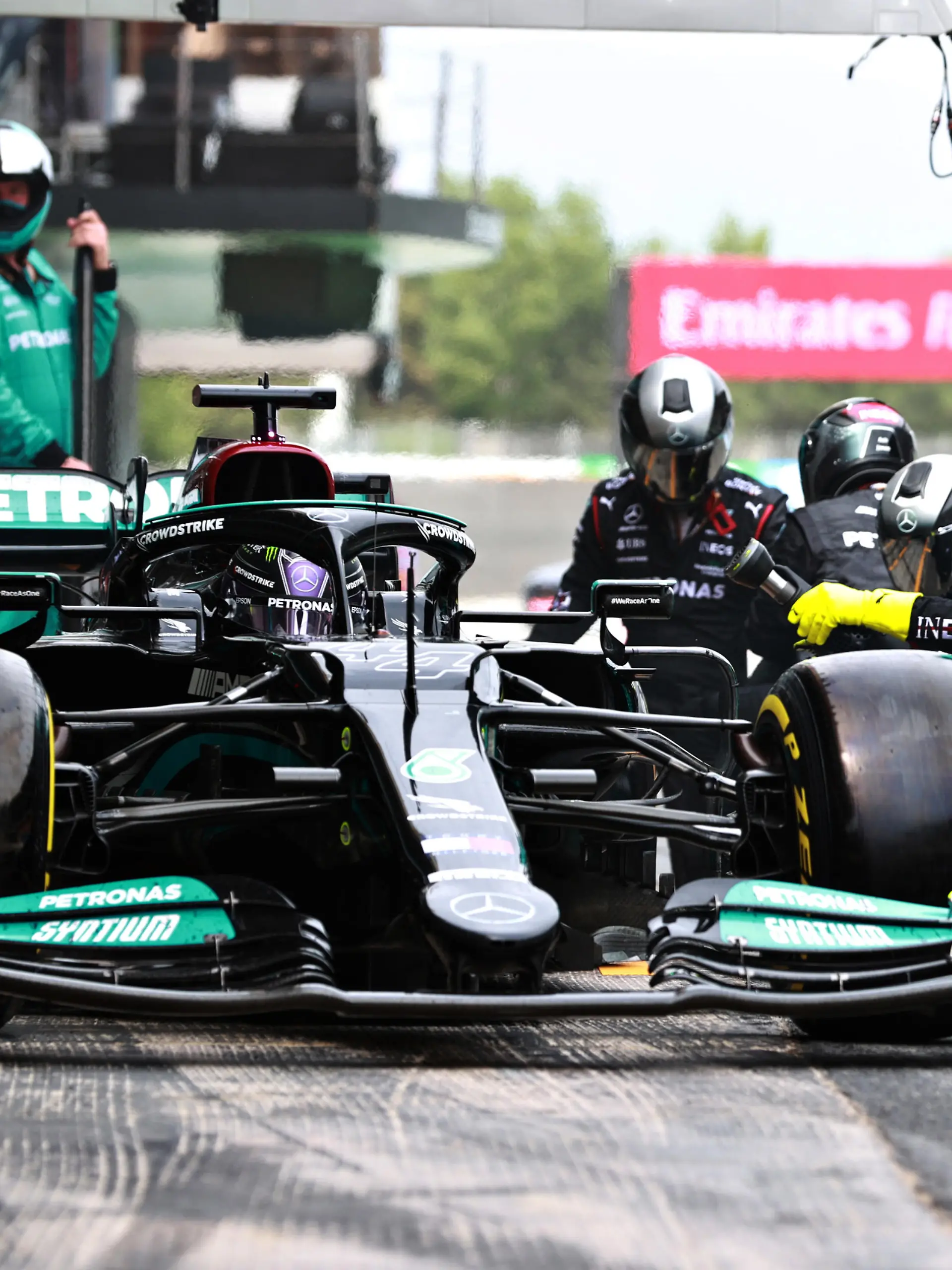 BARCELONA, SPAIN - MAY 09: Lewis Hamilton of Great Britain driving the (44) Mercedes AMG Petronas F1 Team Mercedes W12 makes his second pitstop during the F1 Grand Prix of Spain at Circuit de Barcelona-Catalunya on May 09, 2021 in Barcelona, Spain. (Photo by Mark Thompson/Getty Images)
