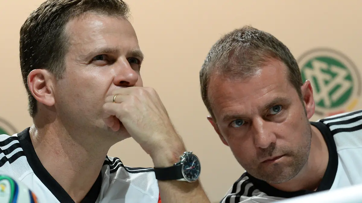 Team manager Oliver Bierhoff (L) and Assistant coach Hans-Dieter Flick of the German national soccer team attend a press conference at the media center in Santo Andre in Brasil, 09 June 2014. The FIFA World Cup 2014 will take place in Brazil from 12 June to 13 July 2014.Photo: Andreas Gebert/dpa +++(c) dpa - Bildfunk+++