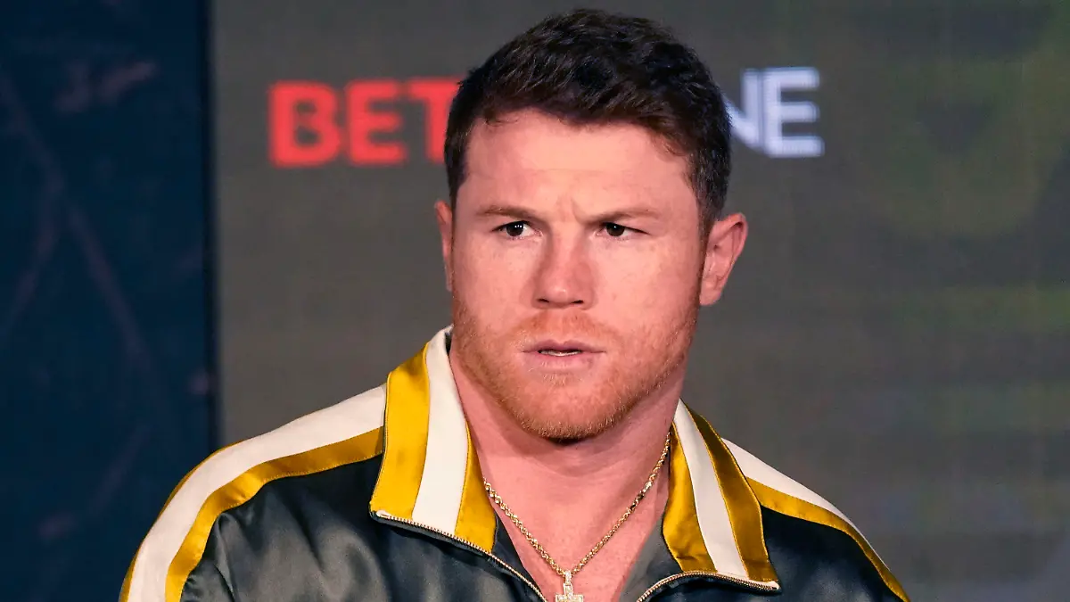 Boxer Canelo Alvarez of Mexico listens during a pre-fight news conference, Thursday, May 6, 2021, in Arlington, Texas. Alvarez fights Billy Joe Saunders on Saturday, May 8, 2021, for the unified super middleweight world championship. (AP Photo/LM Otero)