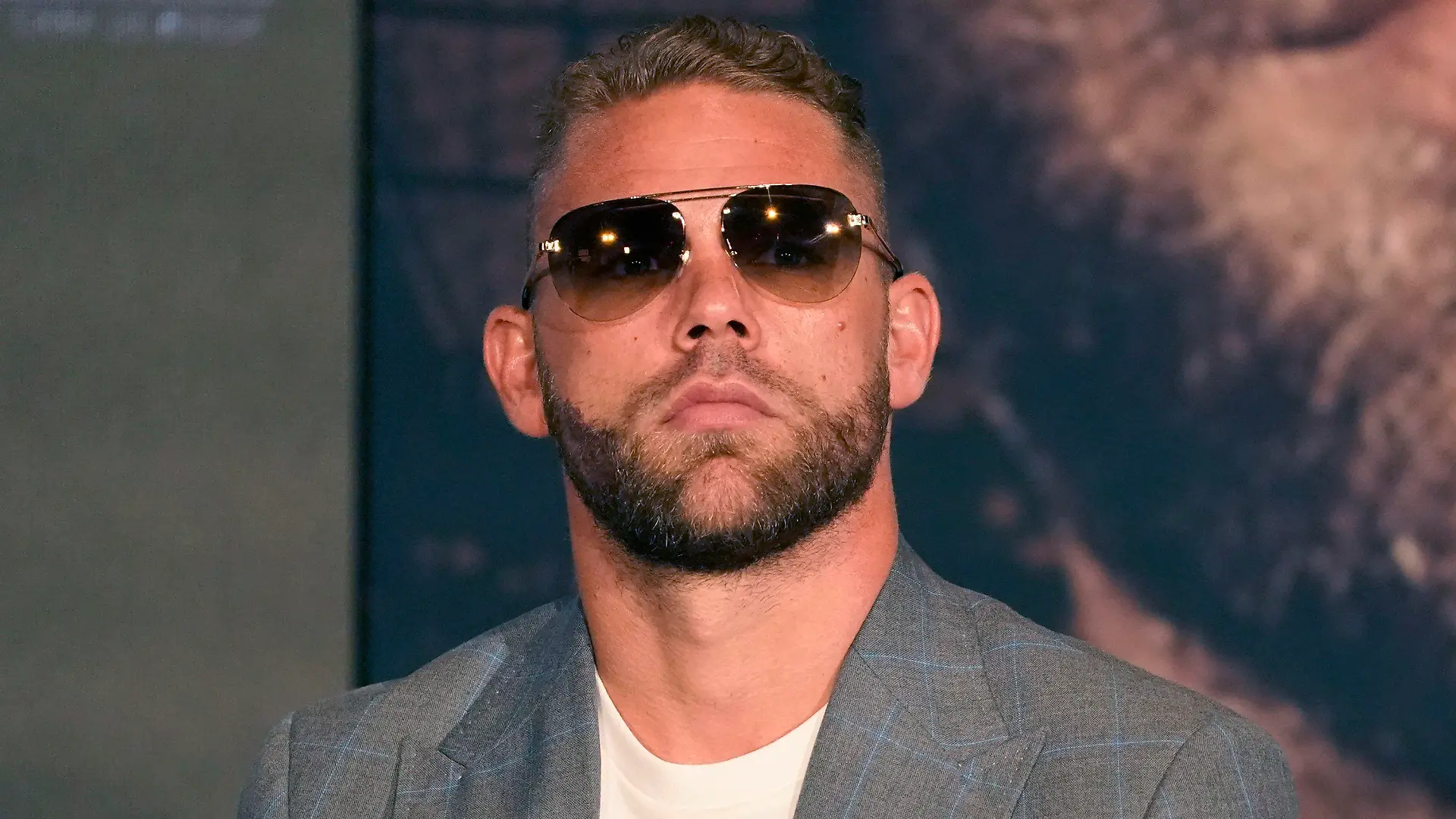 Boxer Billy Joe Saunders of Great Britain listens during a pre-fight news conference, Thursday, May 6, 2021, in Arlington, Texas. Saunders fights Canelo Alvarez on Saturday, May 8, 2021, for the unified super middleweight world championship. (AP Photo/LM Otero)