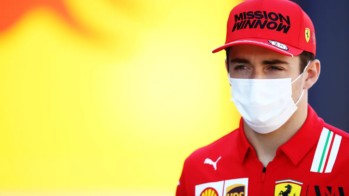 BARCELONA, SPAIN - MAY 06: Charles Leclerc of Monaco and Ferrari walks in the Paddock during previews ahead of the F1 Grand Prix of Spain at Circuit de Barcelona-Catalunya on May 06, 2021 in Barcelona, Spain. (Photo by Mark Thompson/Getty Images)