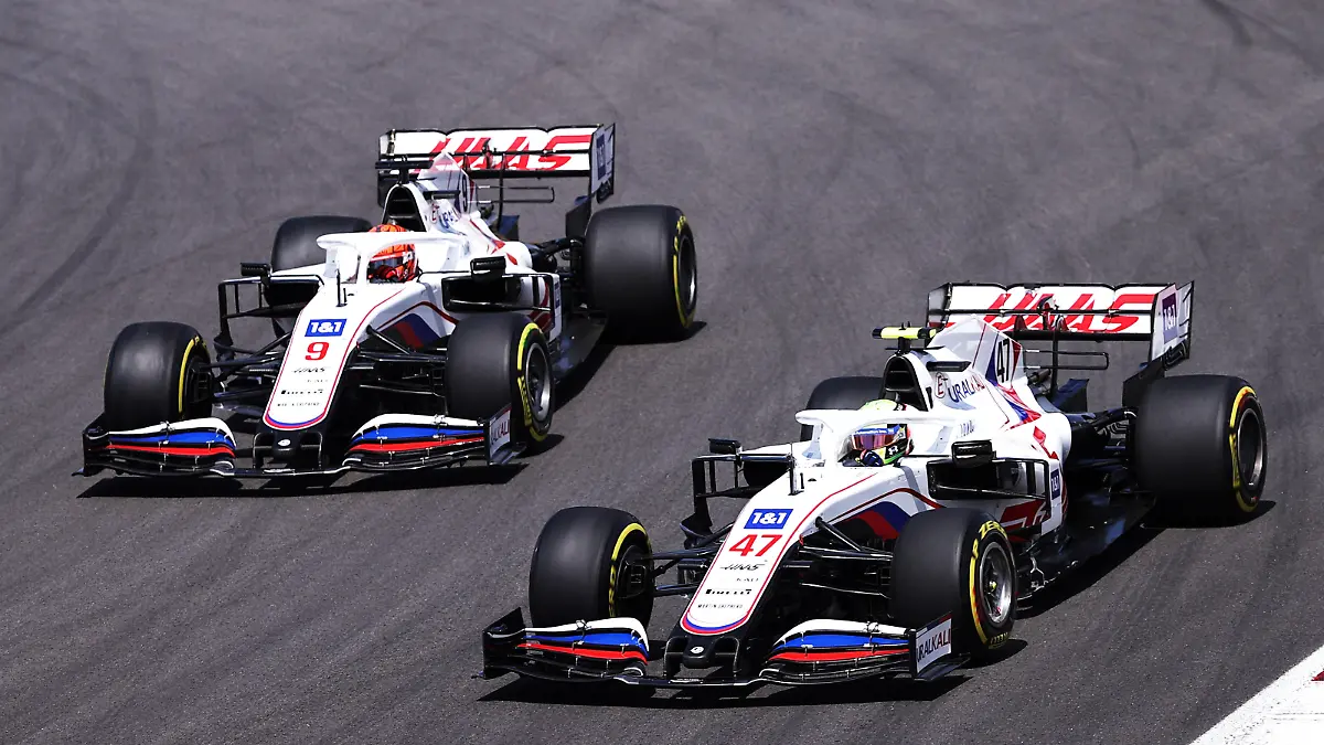 PORTIMAO, PORTUGAL - MAY 02: Mick Schumacher of Germany driving the (47) Haas F1 Team VF-21 Ferrari leads Nikita Mazepin of Russia driving the (9) Haas F1 Team VF-21 Ferrari on track during the F1 Grand Prix of Portugal at Autodromo Internacional Do Algarve on May 02, 2021 in Portimao, Portugal. (Photo by Lars Baron/Getty Images)