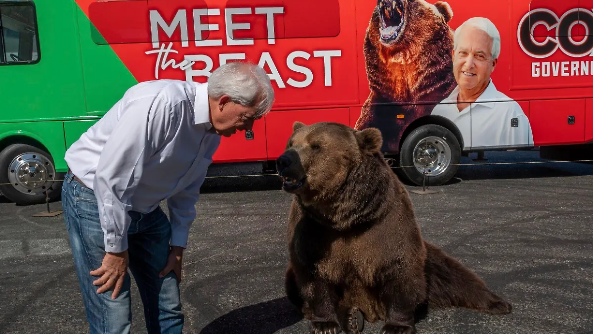 John Cox, Republican recall candidate for California governor, begins his statewide "Meet the Beast" bus tour on Tuesday, May 4, 2021, with Tag, a Kodiak brown bear, at Miller Regional Park in Sacramento. (Renee C. Byer/The Sacramento Bee via AP)