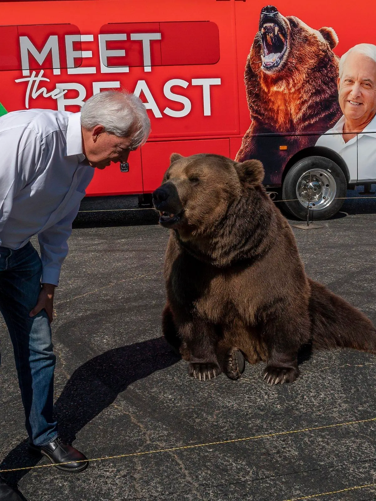 John Cox, Republican recall candidate for California governor, begins his statewide "Meet the Beast" bus tour on Tuesday, May 4, 2021, with Tag, a Kodiak brown bear, at Miller Regional Park in Sacramento. (Renee C. Byer/The Sacramento Bee via AP)