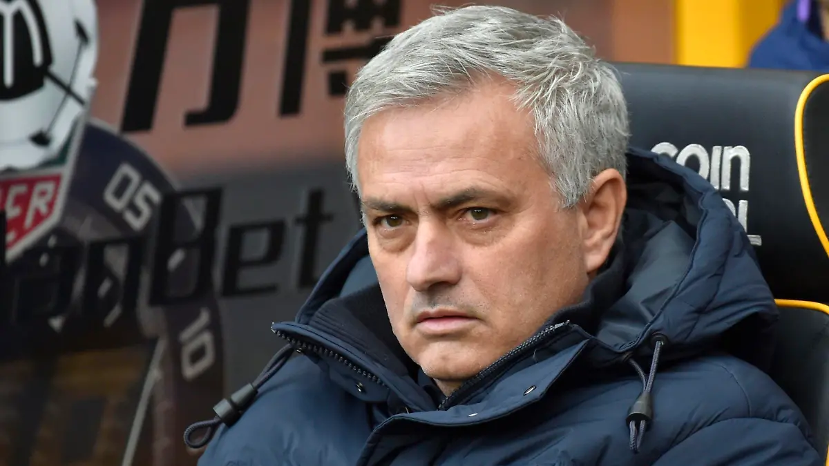 FILE - In this Sunday, Dec. 15, 2019 file photo, Tottenham's manager Jose Mourinho waits for the start of the English Premier League soccer match between Wolverhampton Wanderers and Tottenham Hotspur at the Molineux Stadium in Wolverhampton, England. José Mourinho has been hired to coach Italian club Roma starting next season. The move came a few hours after the club’s American owners announced that current coach Paulo Fonseca will depart at the end of this season. Mourinho’s contract is for three seasons. Mourinho previously coached in Serie A at Inter Milan. (AP Photo/Rui Vieira, File)