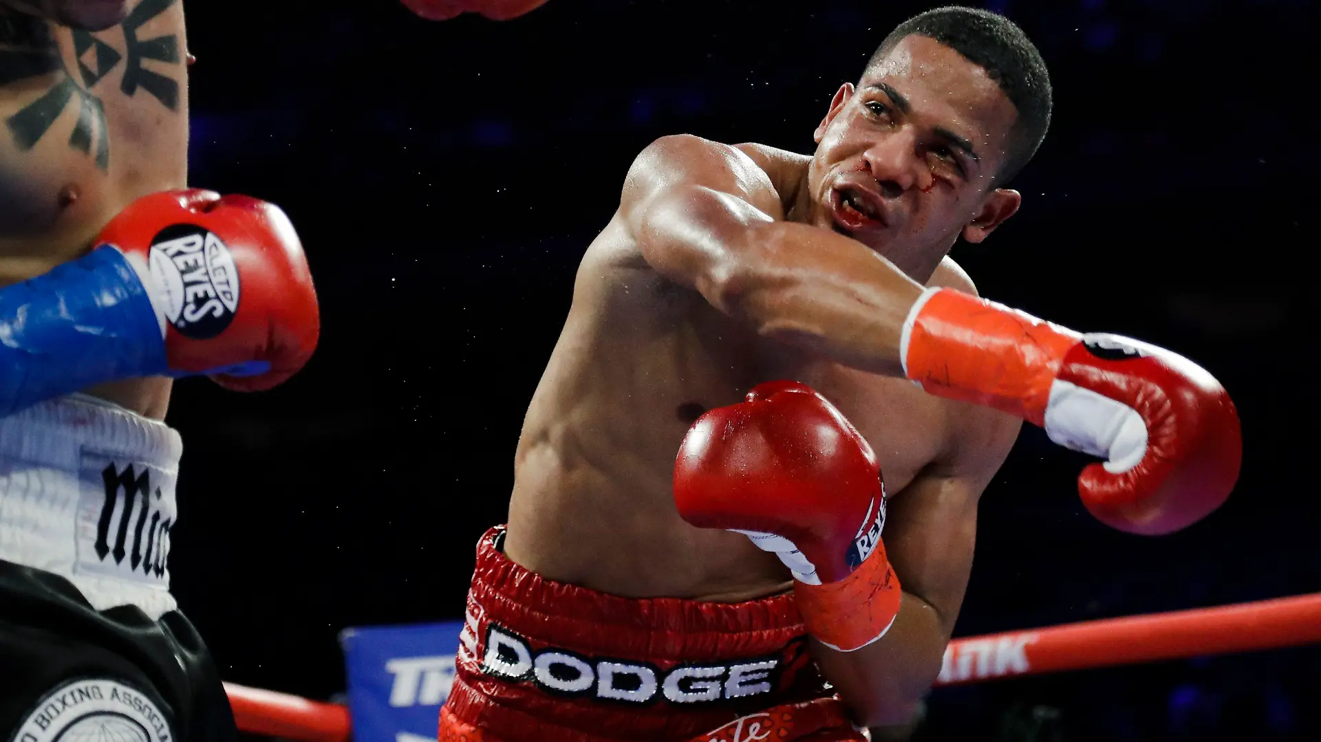 FiLE - In this April 20, 2019 file photo, Puerto Rico's Felix Verdejo, right, punches Costa Rica's Bryan Vazquez during the fifth round of a lightweight boxing match in New York. Verdejo has turned himself in to federal agents on Saturday, May 1, 2021, just hours after authorities identified the body of his 27-year-old lover Keishla Rodríguez in a lagoon in the U.S. territory, a couple of days after she was reported missing. (AP Photo/Frank Franklin II, File)