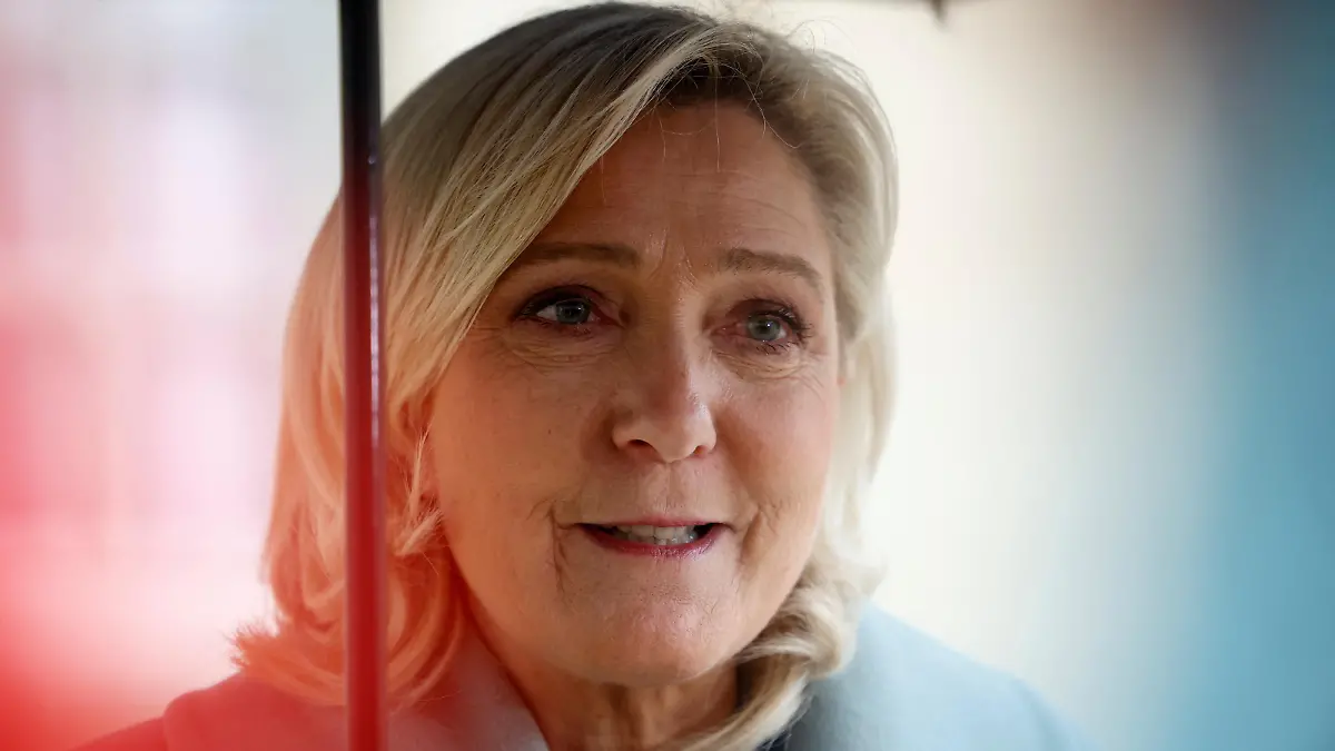 Marine Le Pen, member of parliament and president of the French far-right National Rally (Rassemblement National - RN) party parliamentary group, talks to journalists as she leaves following a meeting with French Prime Minister Elisabeth Borne at the Hotel Matignon in Paris, France, April 11, 2023. REUTERS/Sarah Meyssonnier