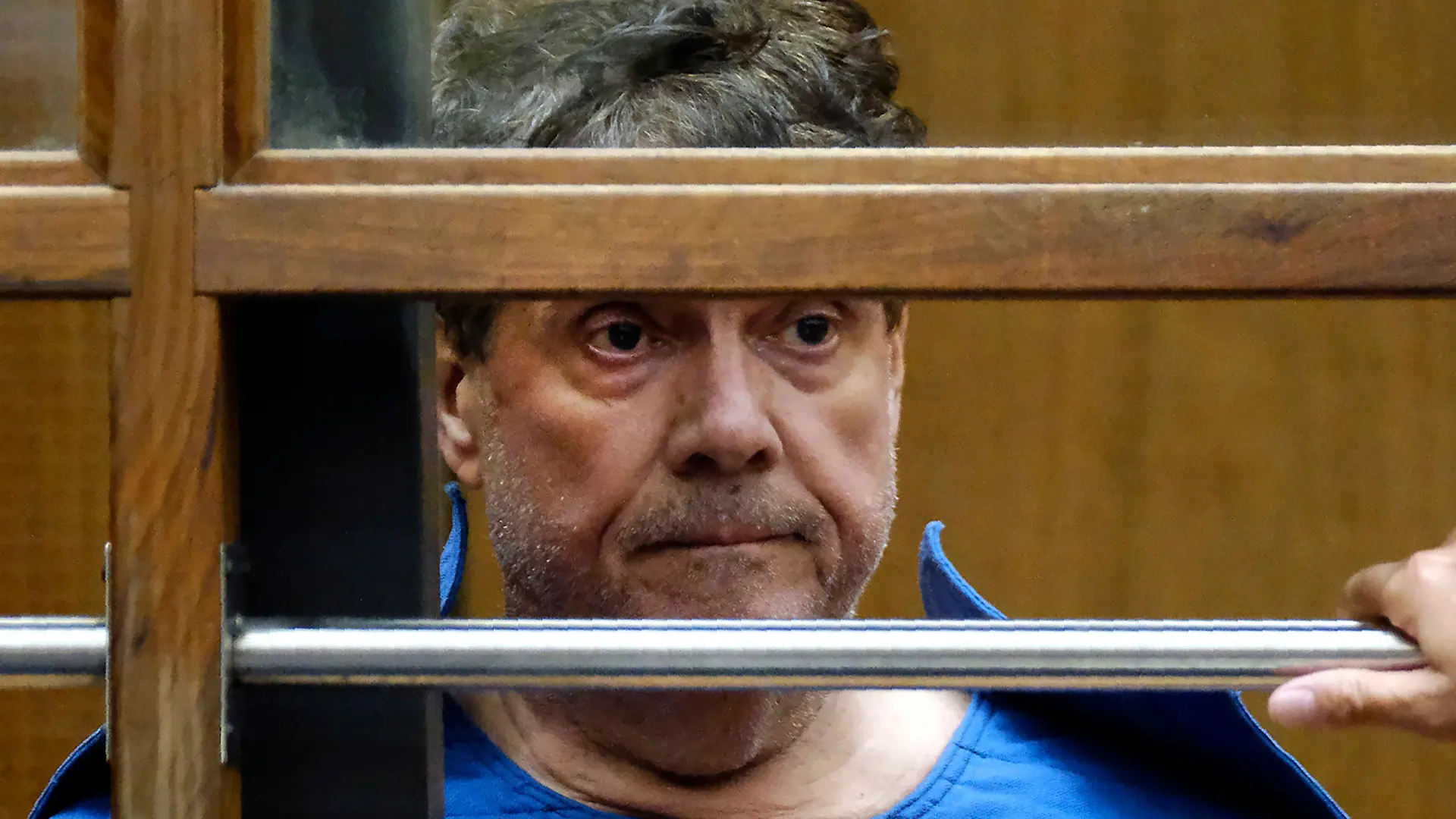 FILE - In this July 1, 2019, file photo, Dr. George Tyndall listens during his arraignment at Los Angeles Superior court in Los Angeles. The University of Southern California has agreed to an $852 million settlement with more than 700 women who have accused Tyndall, the college's longtime campus gynecologist, of sexual abuse, officials announced Thursday, March 25, 2021. (AP Photo/Richard Vogel, File)