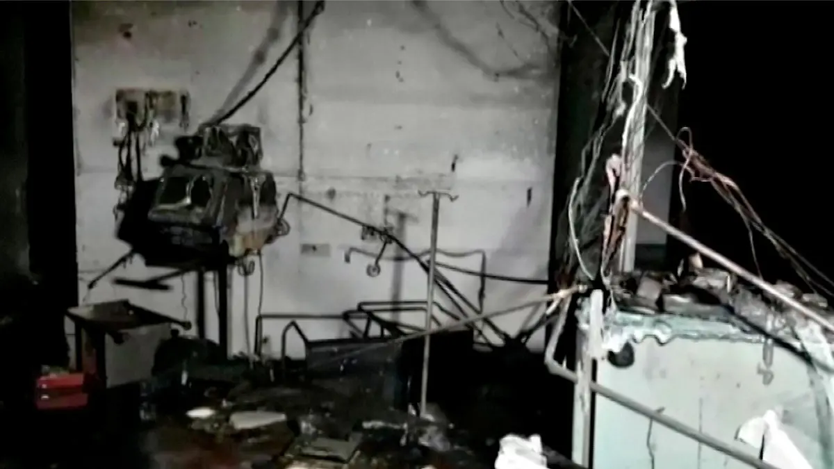Damaged equipment and furniture are seen in the burnt interior of a hospital treating coronavirus disease (COVID-19) patients, after a deadly fire, in India's western Gujarat state, May 1, 2021, in this still image obtained from video. ANI/ Reuters TV via REUTERS ATTENTION EDITOS - THIS IMAGE WAS PROVIDED BY A THIRD PARTY. NO RESALES. NO ARCHIVE. INDIA OUT. NO COMMERCIAL OR EDITORIAL SALES IN INDIA. Broadcasters: NO USE INDIA Digital: NO USE INDIA. For Reuters customers only.
