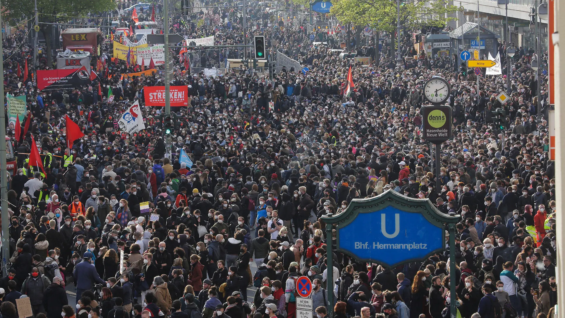 Thousands of protestors attend a May Day rally at the Hermannplatz square in Berlin, Germany, Saturday, May 1, 2021. (AP Photo/Markus Schreiber)